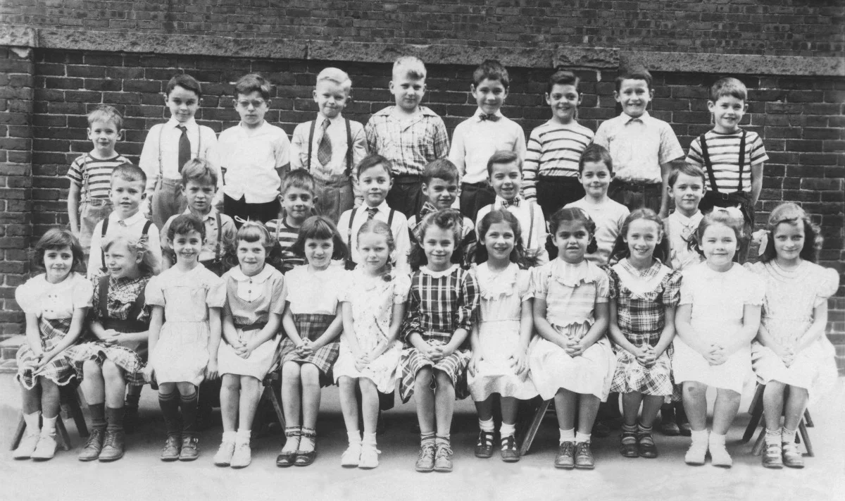 Ms. Mill’s Agassiz School second grade class of 1948-1949 Back row : first on left, Michael Lennon; Second row : first on left, Arthur Tilley; fourth from left, Paul Hinckley; Front row : sixth from left, Jane VanZandt Courtesy of Art Tilley.