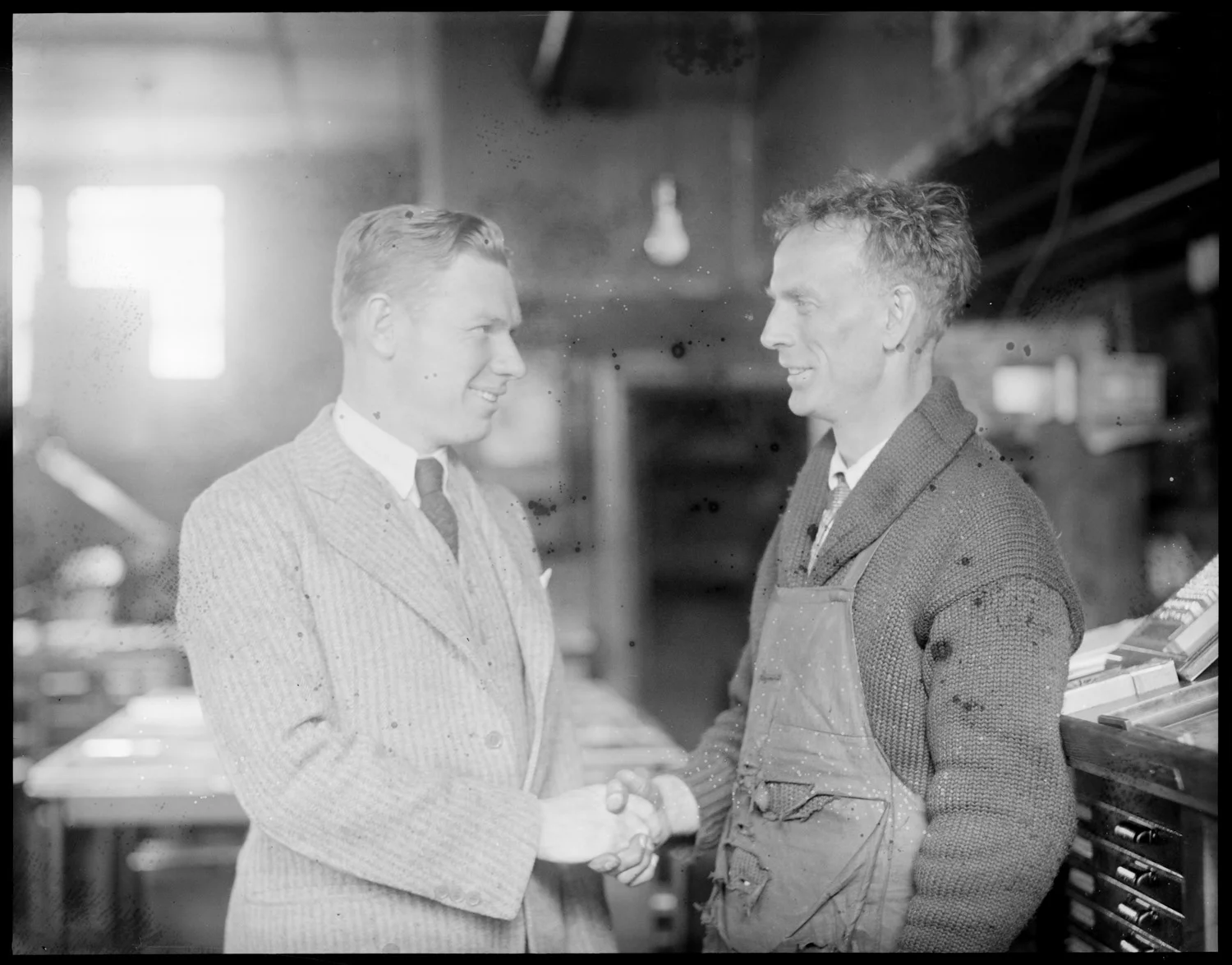 Charley Paddock, star sprinter of the age, calls on Clarence DeMar (1888-1958), another star runner, at his printing office in Jamaica Plain (May 5, 1928). https://www.flickr.com/photos/boston_public_library/5616855051/in/photolist-9ykRjt-9ykQCi