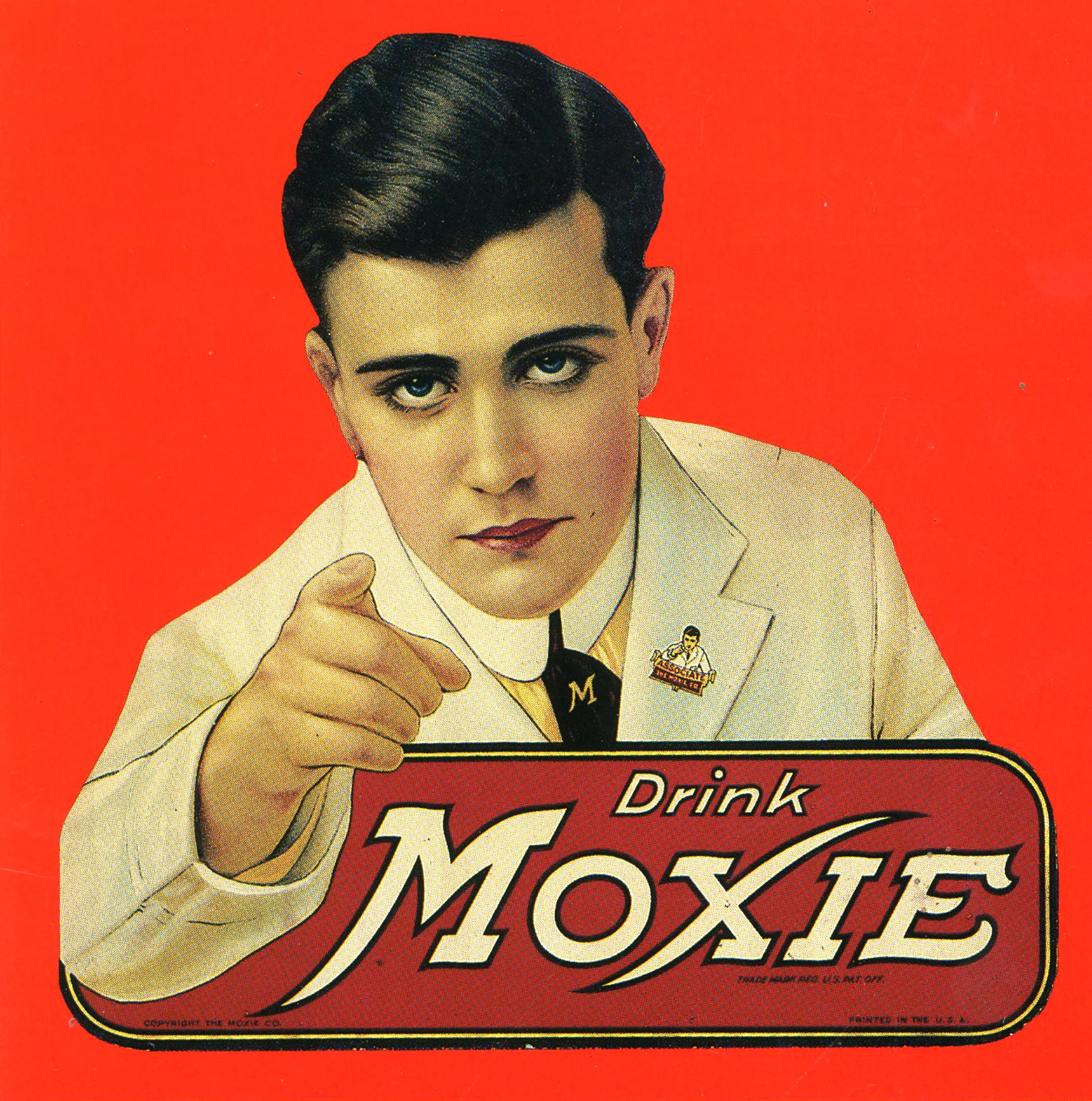 The “Moxie guy” still in his original white lab coat with his darker hair and deep set eyes.