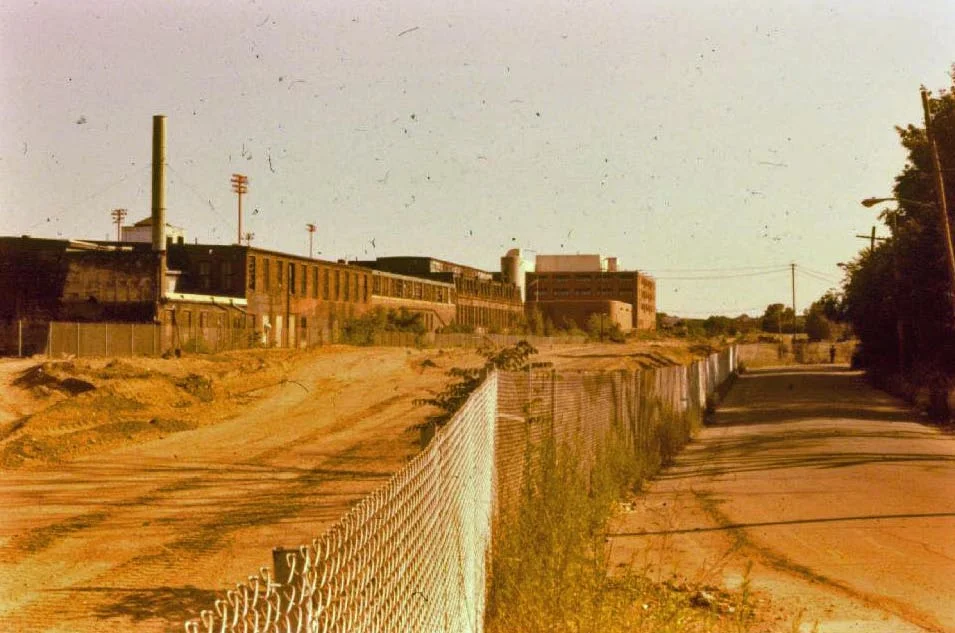 Construction of the Southwest Corridor rail lines and park in Jamaica Plain in the early 1980s. View from Everett St. looking towards the old Sturtevant factory on Amory St. Photograph courtesy of Will and Sharlene Cochrane. Higher resolution copies of images in this gallery can be found at: http://www.archive.org/details/1980sPhotographsGreenSt.AmorySt.EverettSt.JamaicaPlain