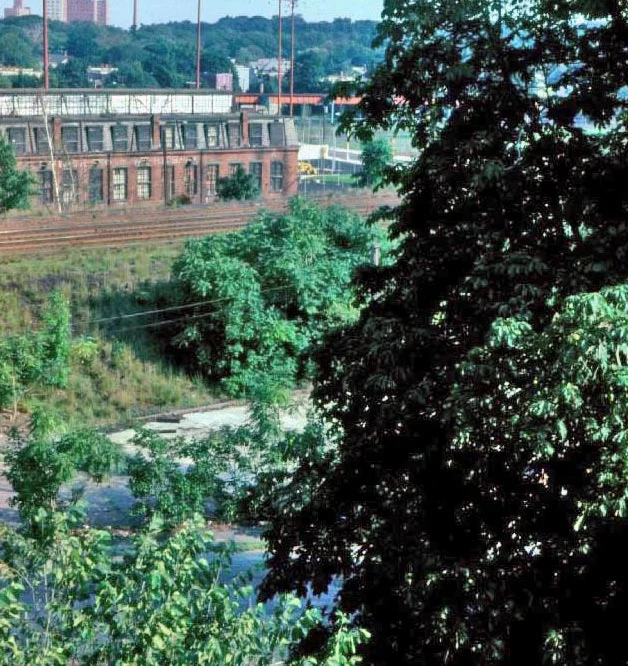 Taken from roof of 41 Everett Street showing intersection of Everett and Call Street, the old railroad embankment, and the orange line. Photograph courtesy of Will and Sharlene Cochrane. Higher resolution copies of images in this gallery can be found at: http://www.archive.org/details/1980sPhotographsGreenSt.AmorySt.EverettSt.JamaicaPlain