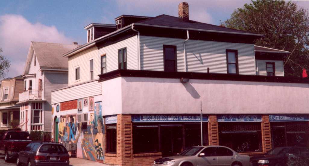 The duplex was similar to the one built behind it in 1872 facing Washington Street that was replaced by a commercial building in 1924.