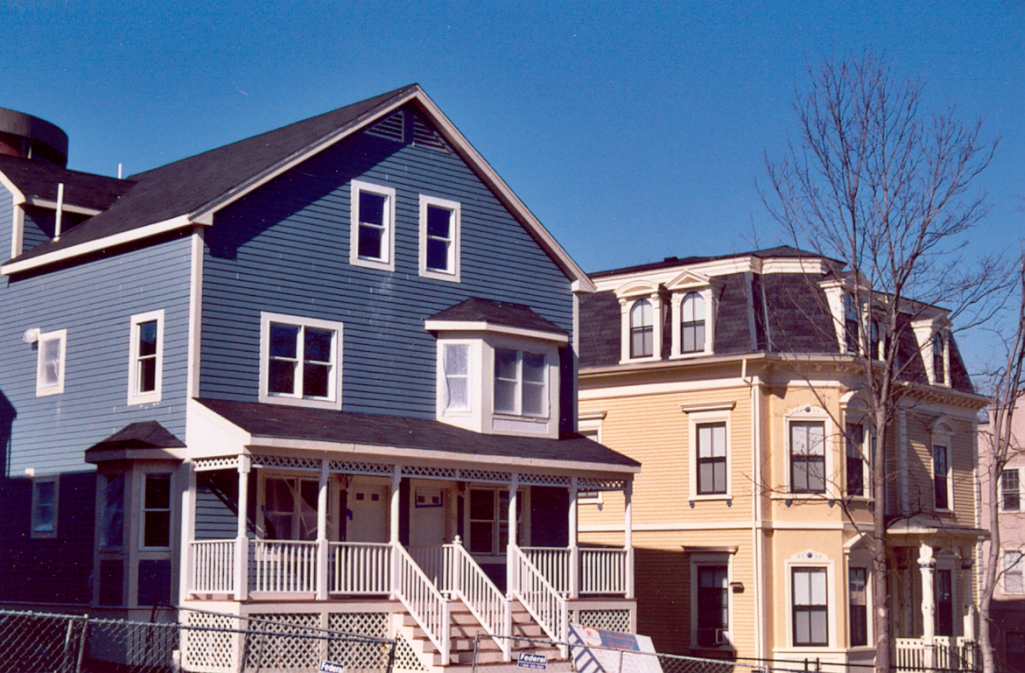 21-23 and 19 Westminster Avenue. 19, on the right, was built about 1872 for H.A. Thomas. 21-23 was built by Urban Edge in 2003 as first time home-buyer condos. Designed by Stull & Lee.