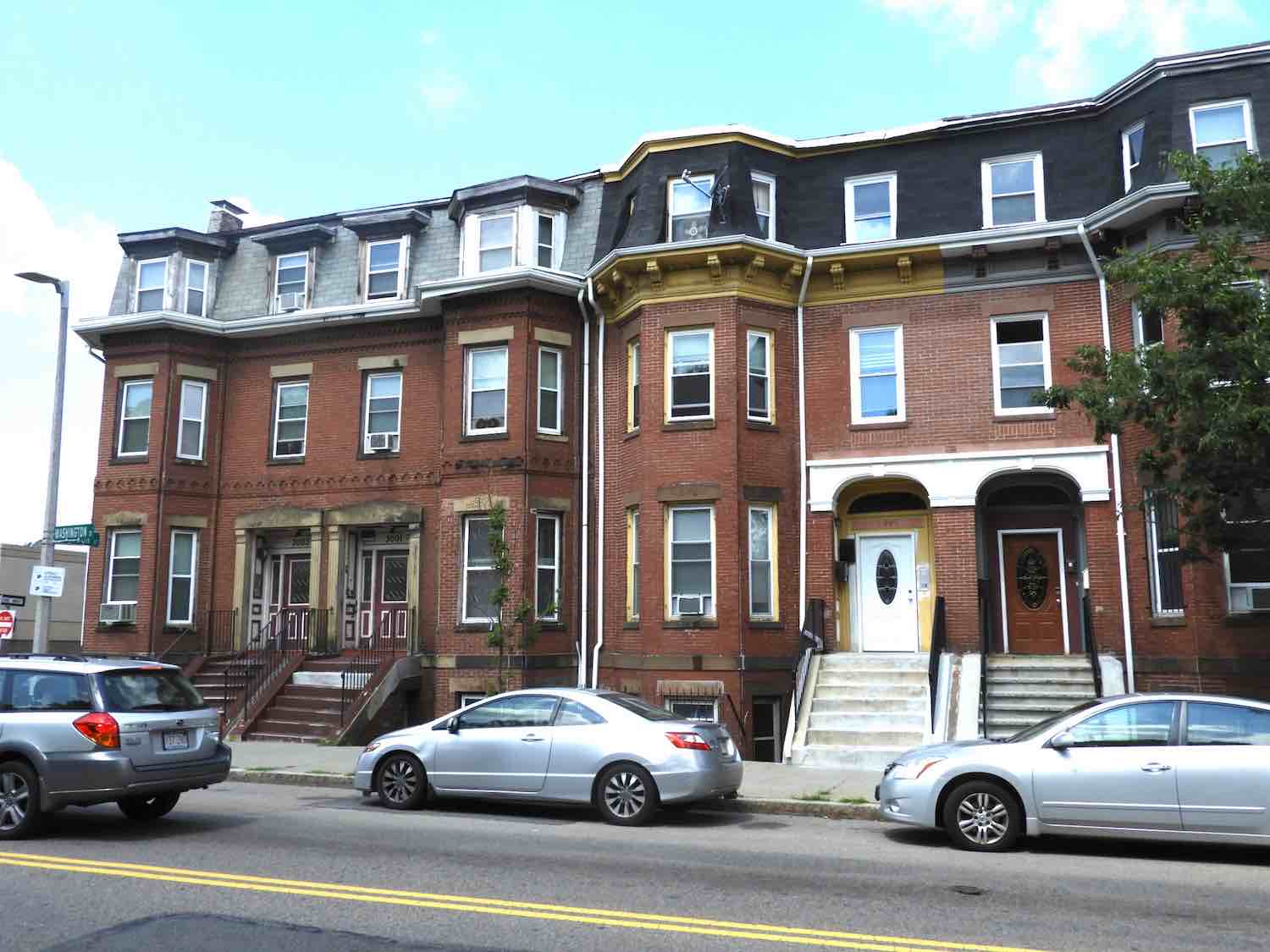 Detail of 2991-3003 Washington Street built by George Allen about 1872- 1873. A series of four, three –story, double townhouses with mansard roofs. The first housing developed easterly of Egleston towards Dudley Square, the South End-style row house never caught on in Egleston Square.