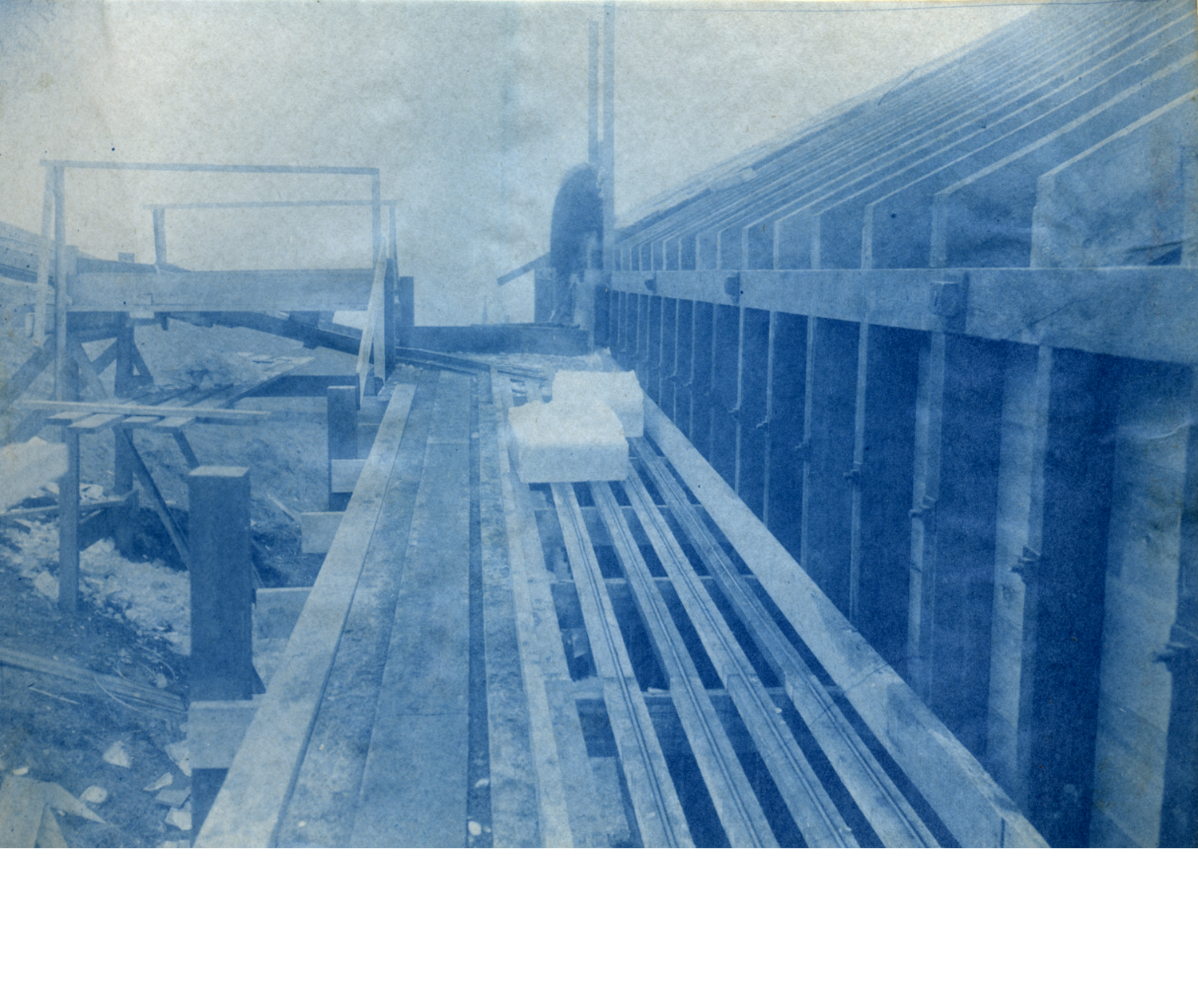 Ice slides down a conveyor at an ice house at Jamaica Pond. Courtesy of the City of Boston Archives. Full resolution image and more information here .