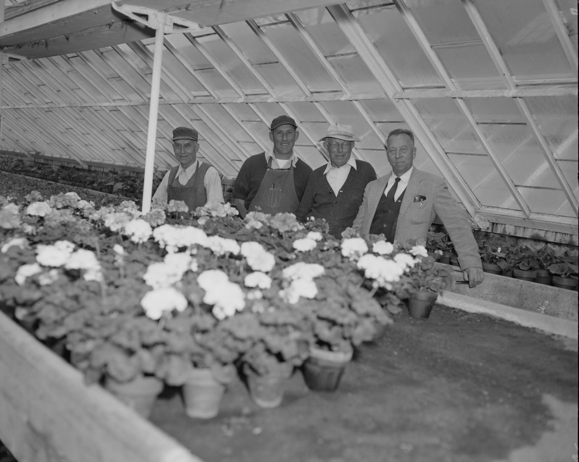  Photo from the Leon Abdalian collection of the Boston Public Library of  labelled: Forest Hill Cemetery employees. [Charles H.] Fox, [Daniel] Campagna, with cap, and straw hat. More images of FHC staff are available at the Digital Commonwealth.  