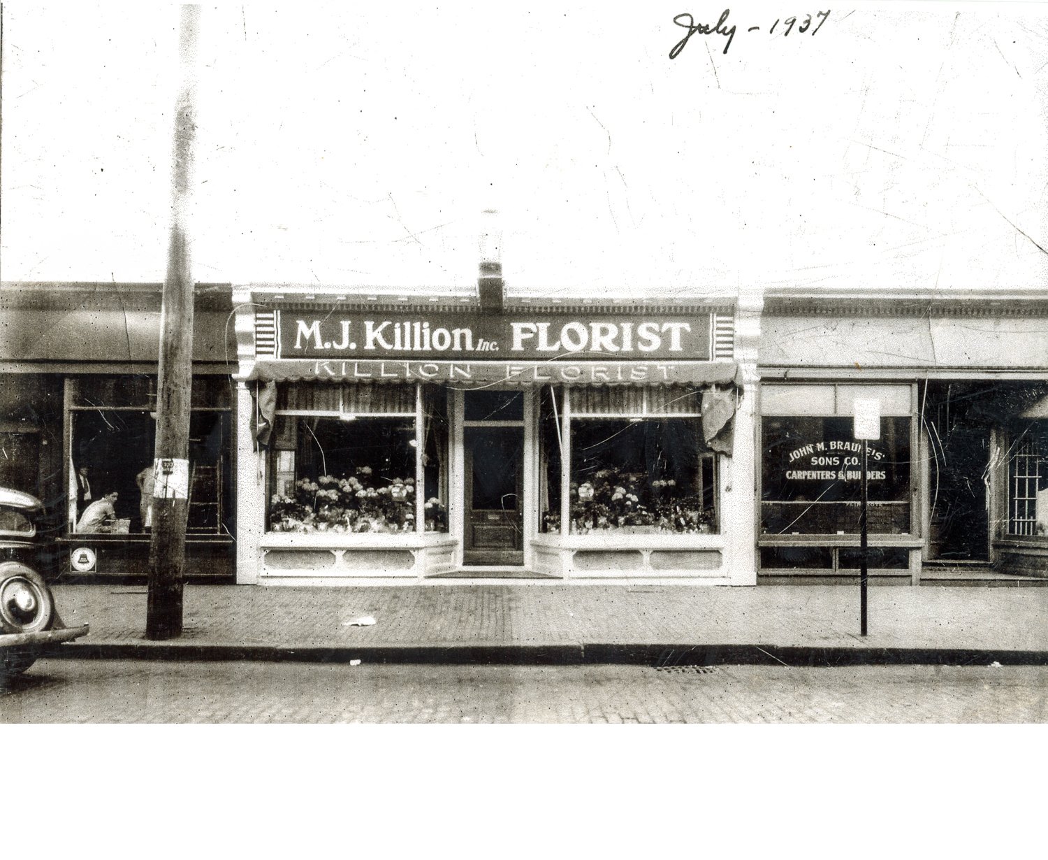 M.J. Killion Florist Shop which was located at 3694 Washington Street (per City Directories). Picture dated July 1937. In 2025, this location houses the Forest Hills Diner. Download