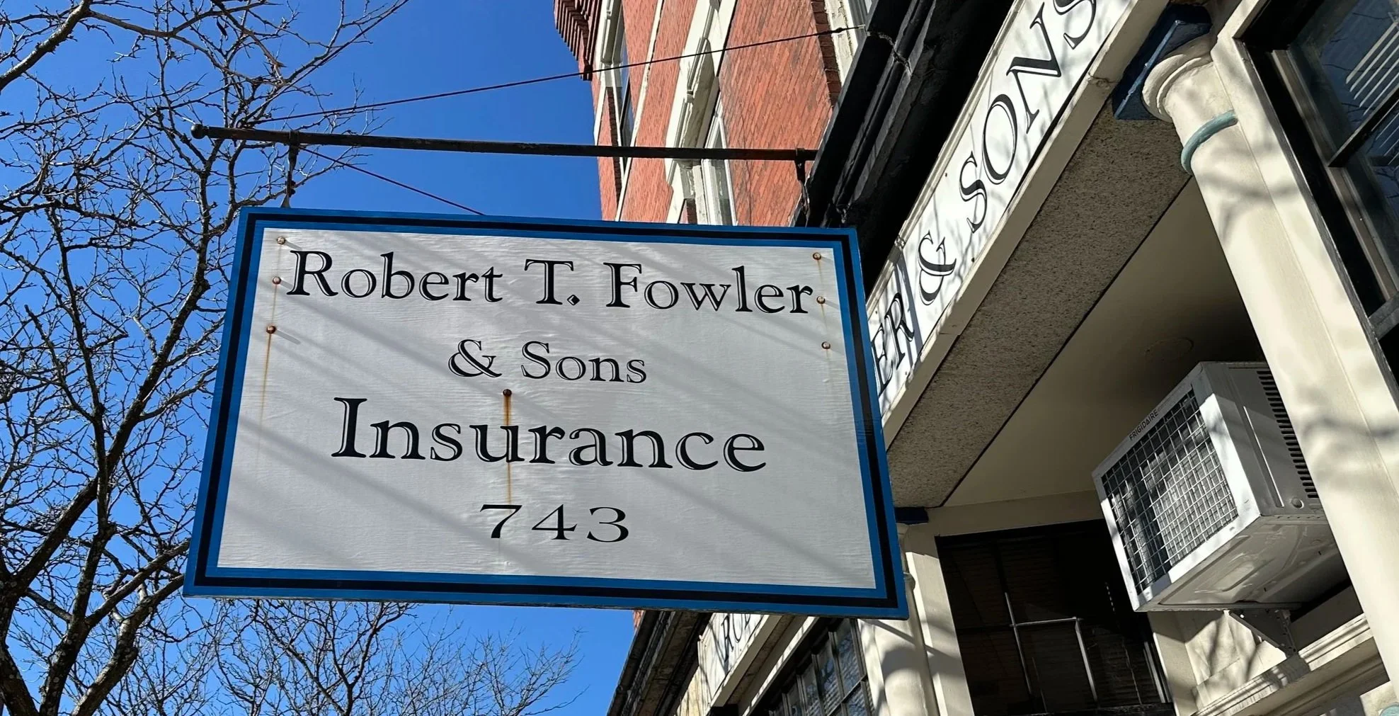 Robert T. Fowler & Sons Insurance sign at 743 Centre St