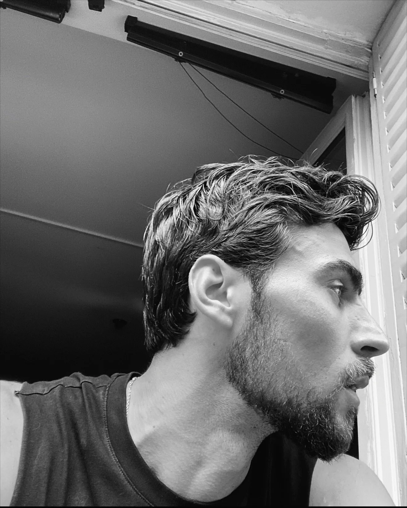 Black &amp; white frames.
Paris, a horn, a hand, a weight.
Miles whispered cool into chaos &mdash;
I answer, one push at a time.