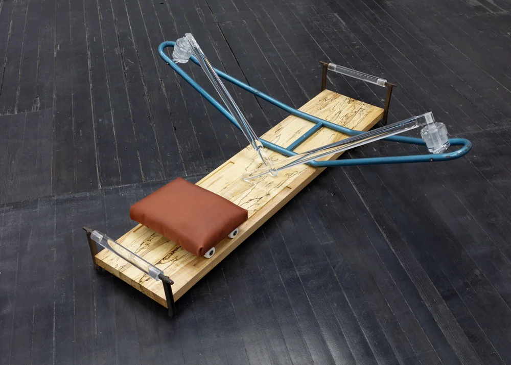 rowing machine , 2018 found parts, acrylic, spalted maple, iron, steel, cast plaster, bearings, leather 55.5 x 54 x 16.5 in KO1011
