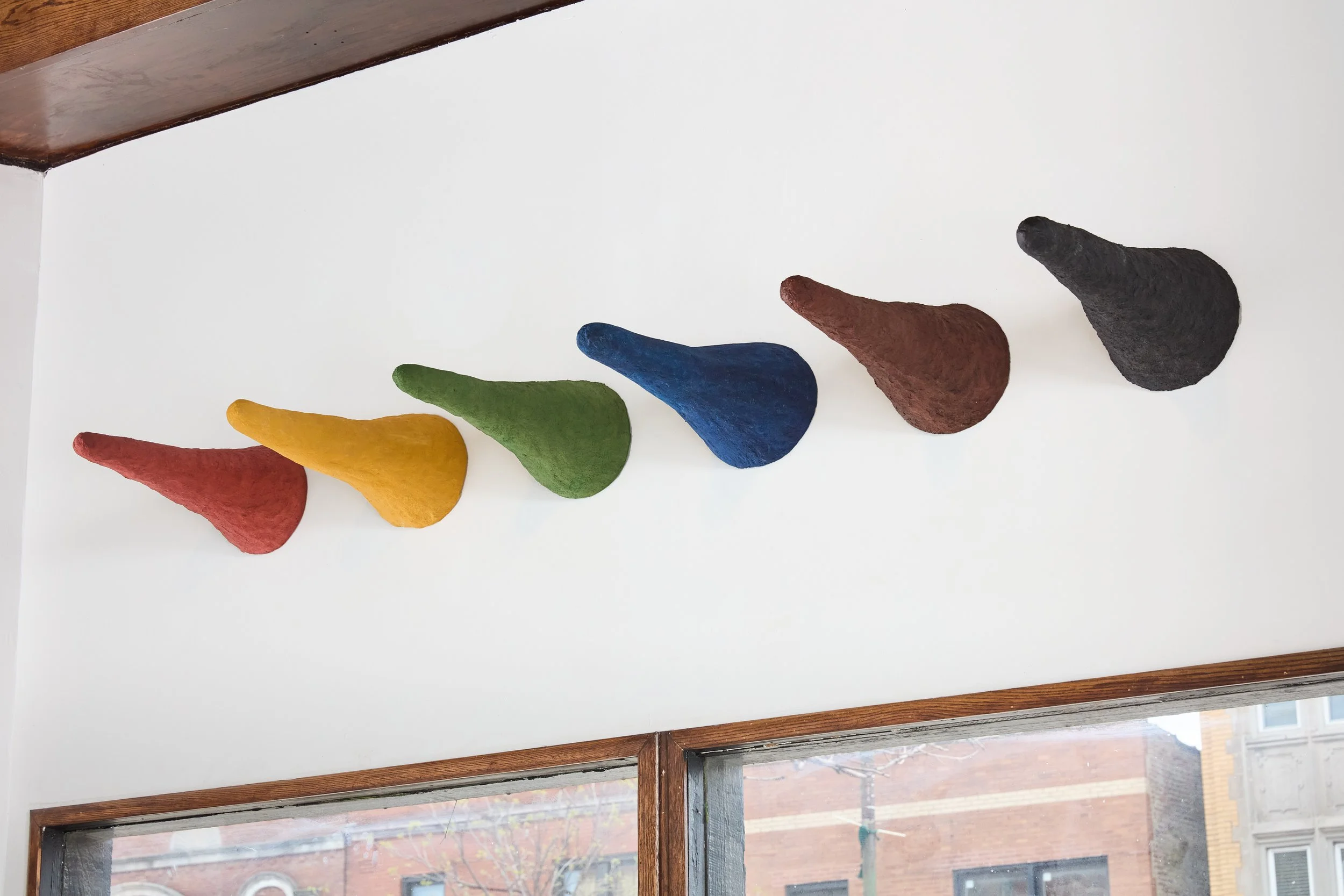   Cones  (2022), tabu-no-ki wood powder, guar gum and wood, natural pigments, essential oils, 18 x 8 x 8 in. (46 x 20 x 20 cm) 