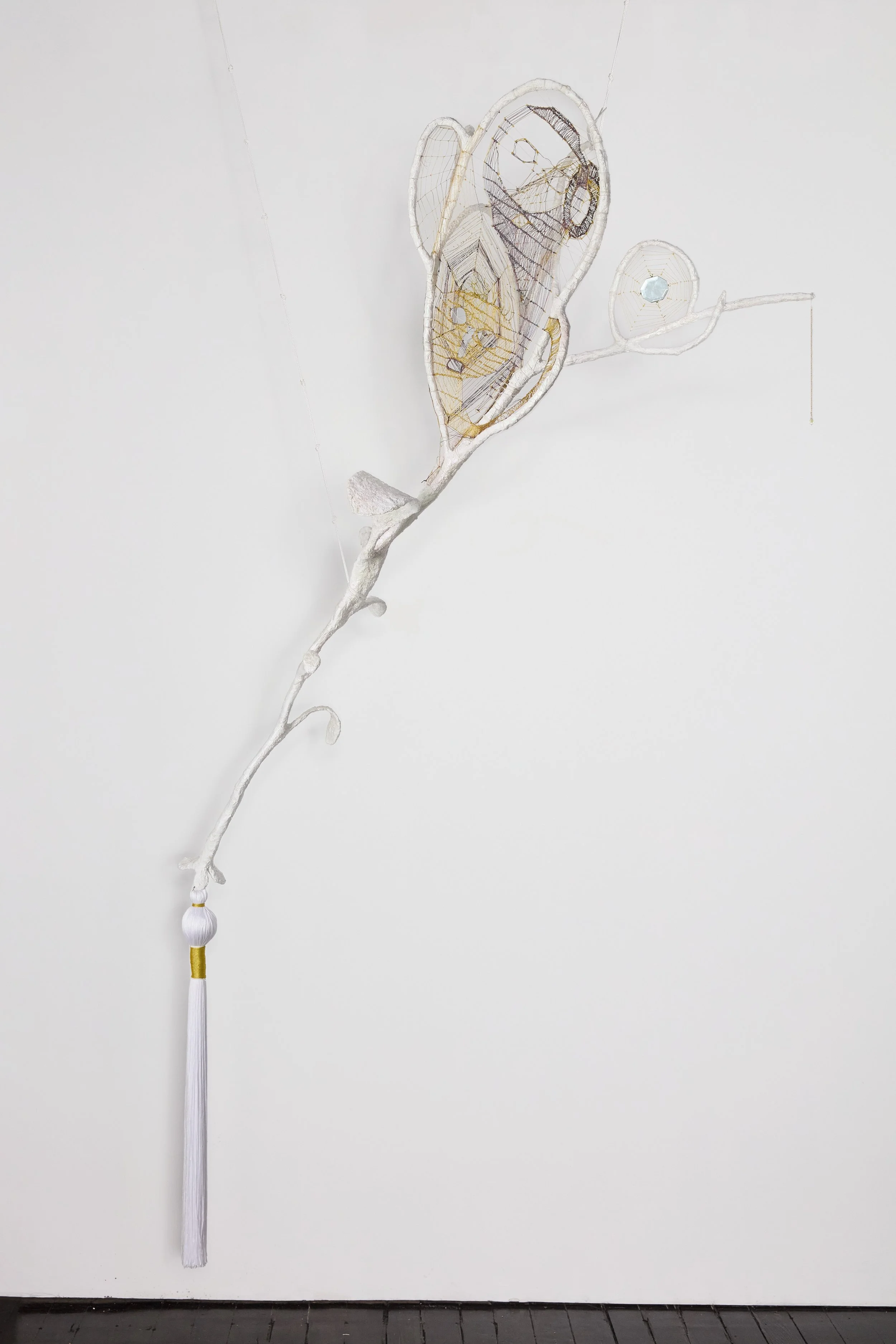   Orchid Wand , 2026 reeds, earrings, branches, wire, resin, crystals, lamé cord, linen cord, rope, chain, plastic flowers 74 x 12 x 18 in. (188 x 30 x 46 cm) 