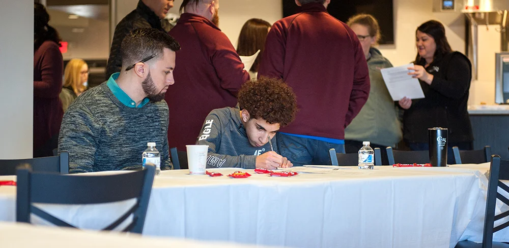 Clark Service Group mentor, Tilghman Grandstaff, gets aquainted with his mentee, Adam, from Conestoga Valley High School.