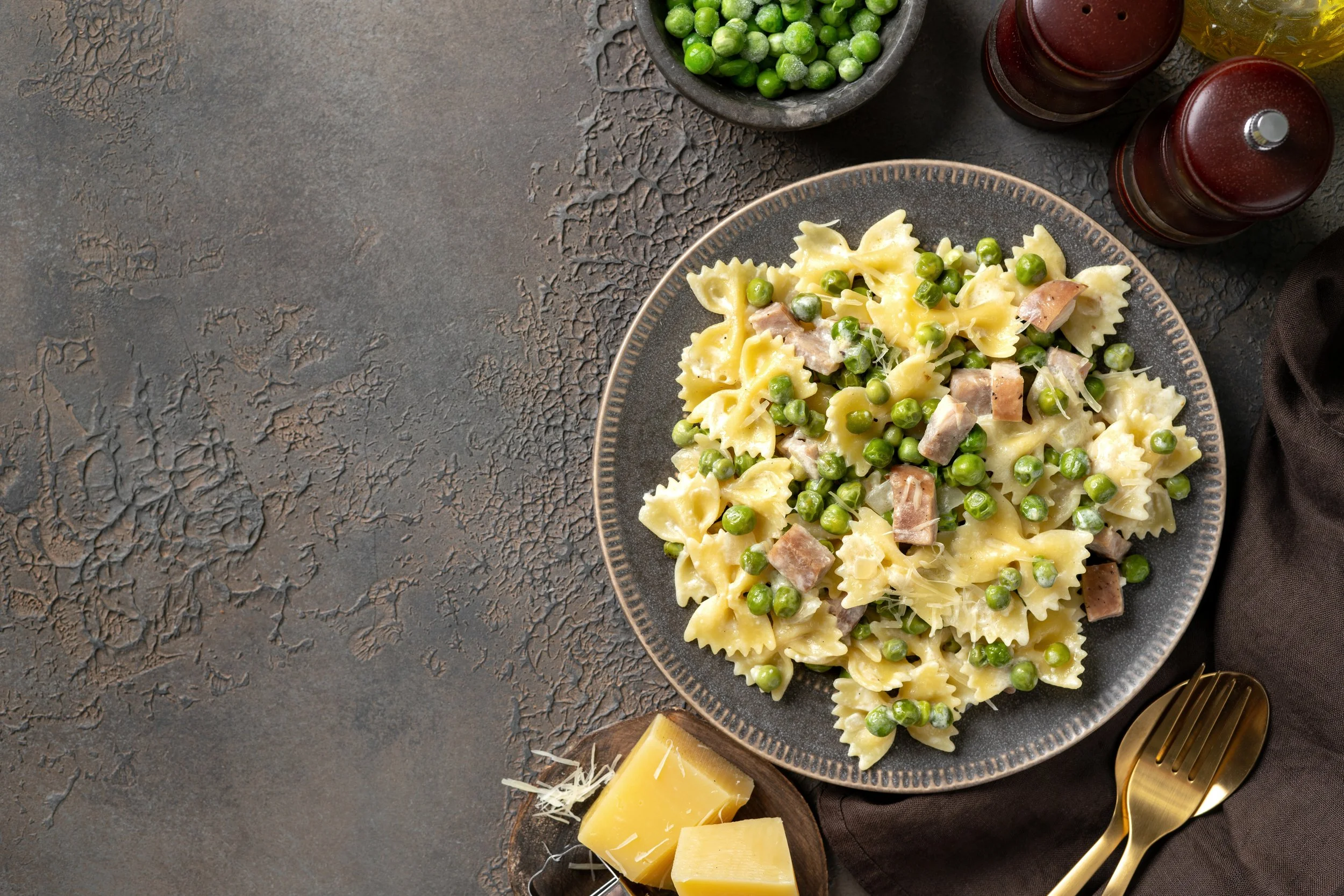Farfalle parmesan peas and prosciutto cream sauce.jpg (Copy) (Copy)
