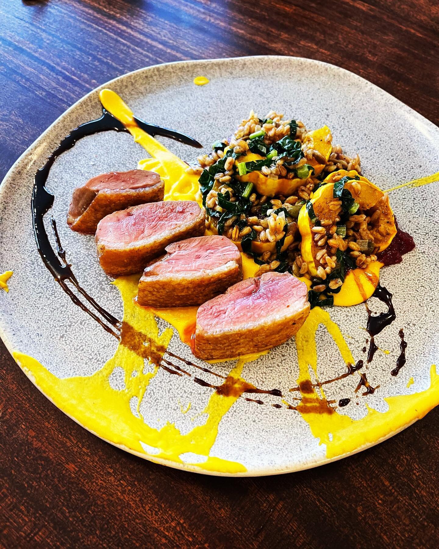 Dry aged Rohan duck breast, miso-butternut pur&eacute;e, farro, kale &amp; delicata squash finished with saba! #boom #eatlocal