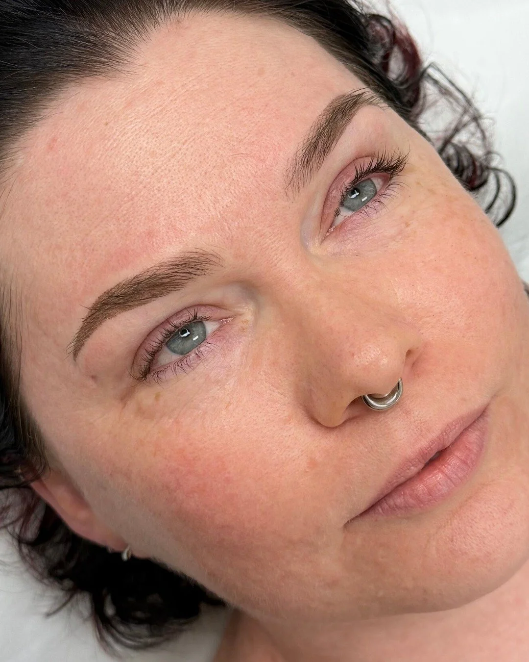 Combo brows for that natural, fluffy finish. 

This is what we mean when we talk about bespoke brow design: hair strokes mapped to your natural growth pattern, soft shading for dimension, and pigment matched to your skin tone and colouring. 
The resu