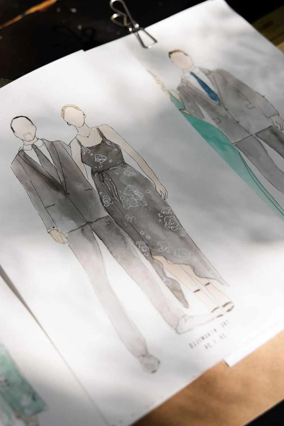 Golden Rose Creative live wedding illustrations and wedding painter capturing guests in black tie attire in watercolour painting as a wedding favour