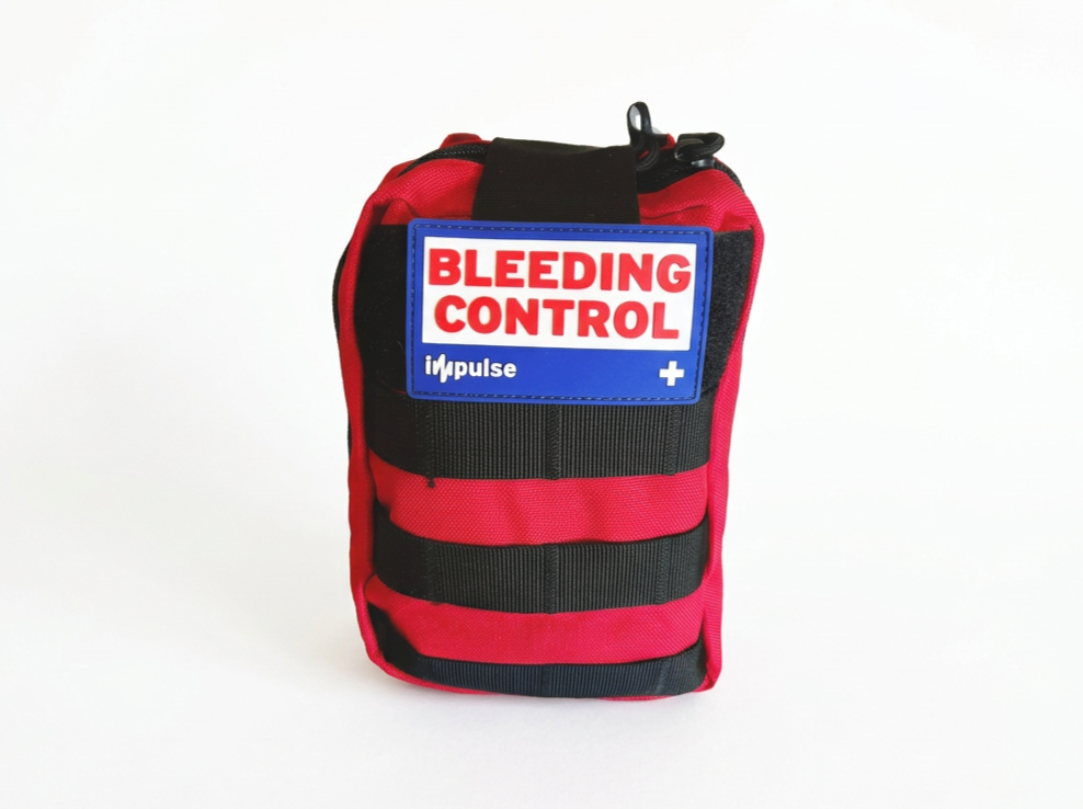 Impulse Bleeding Control Kit with a label that reads Bleeding Control on a red and black bag.