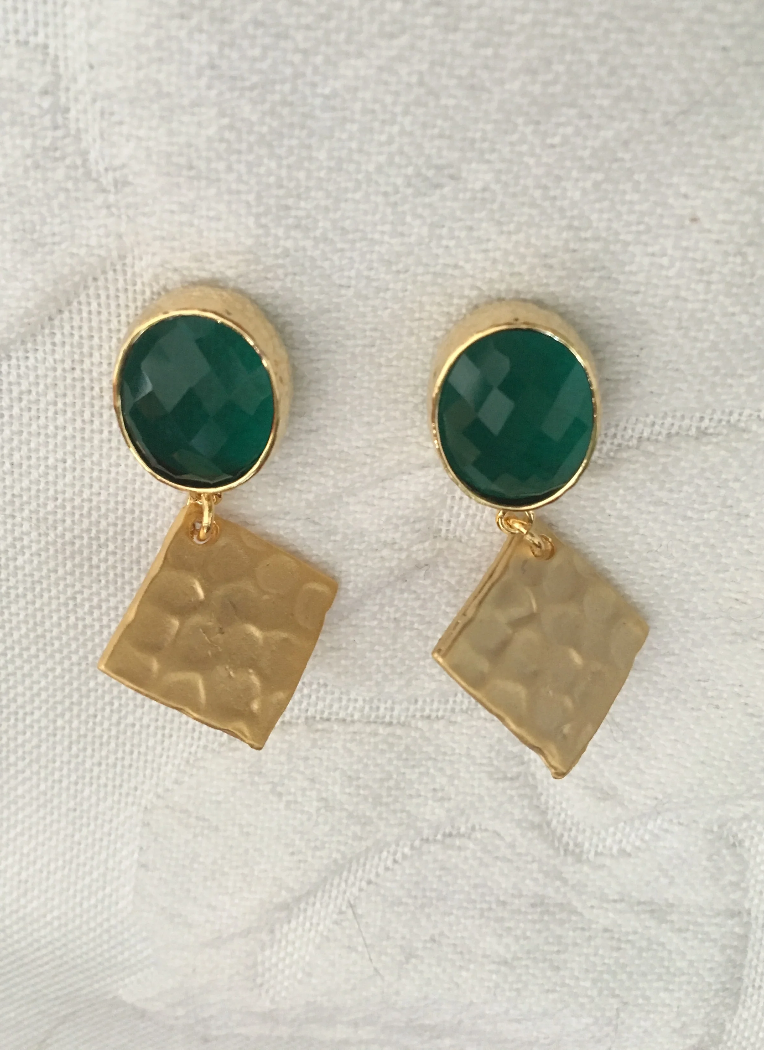 Emerald green faceted crystals and hammered gold 