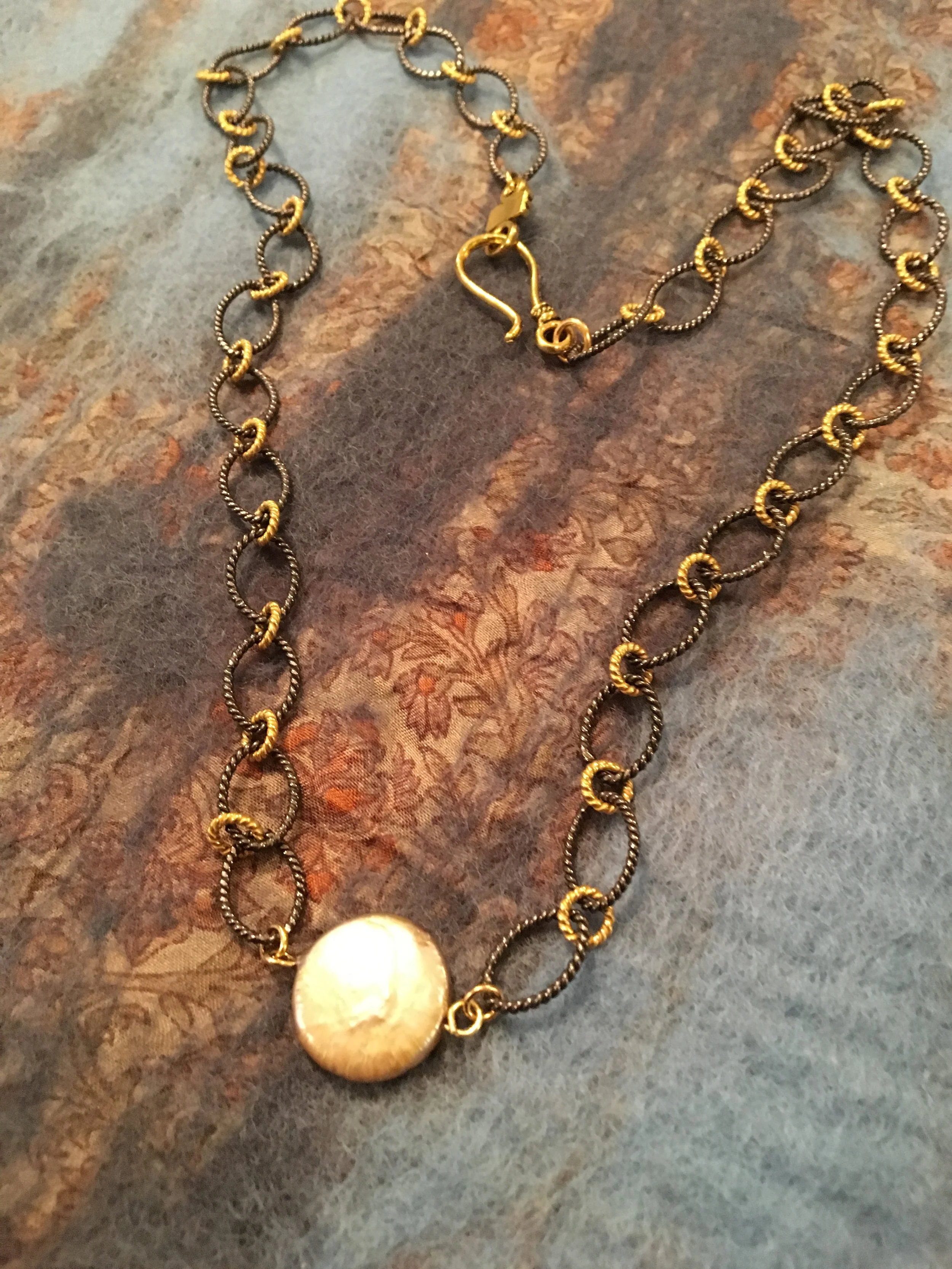 Golden freshwater coin pearl on adjustable two-toned necklace