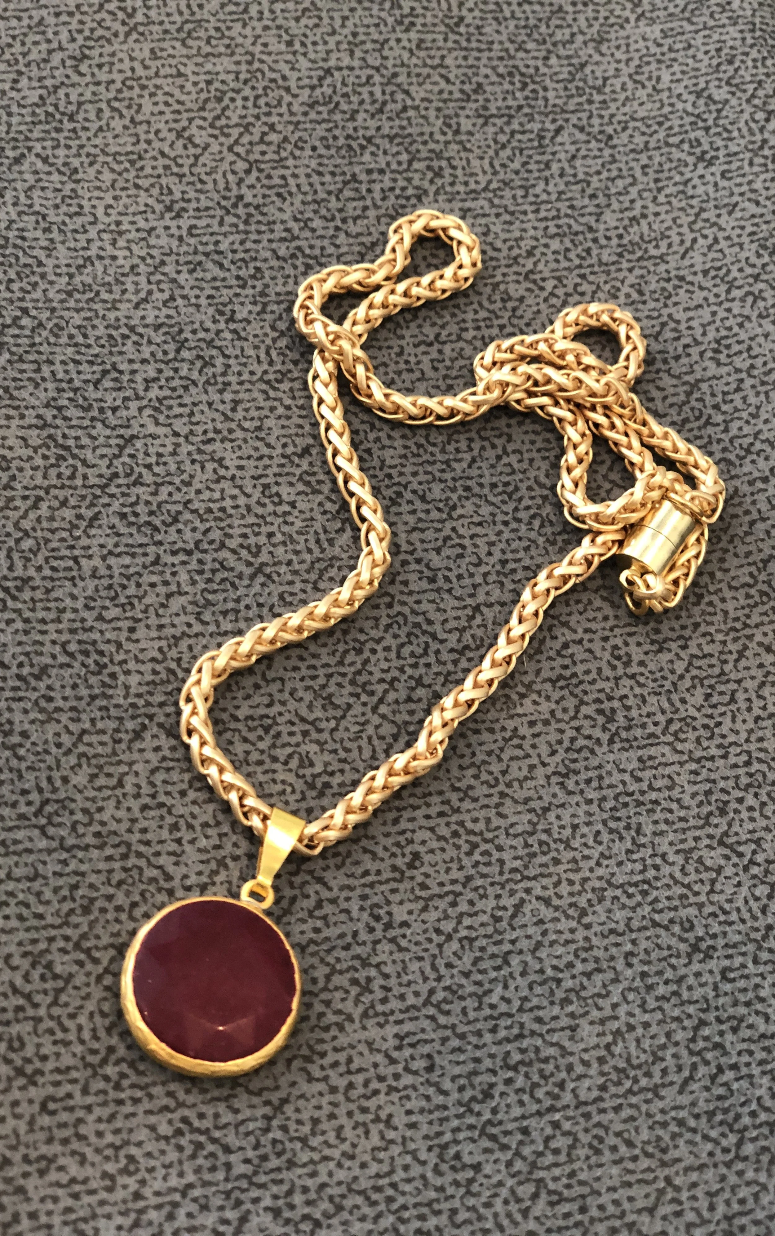 Matte gold necklace with deep red faceted jade pendant 