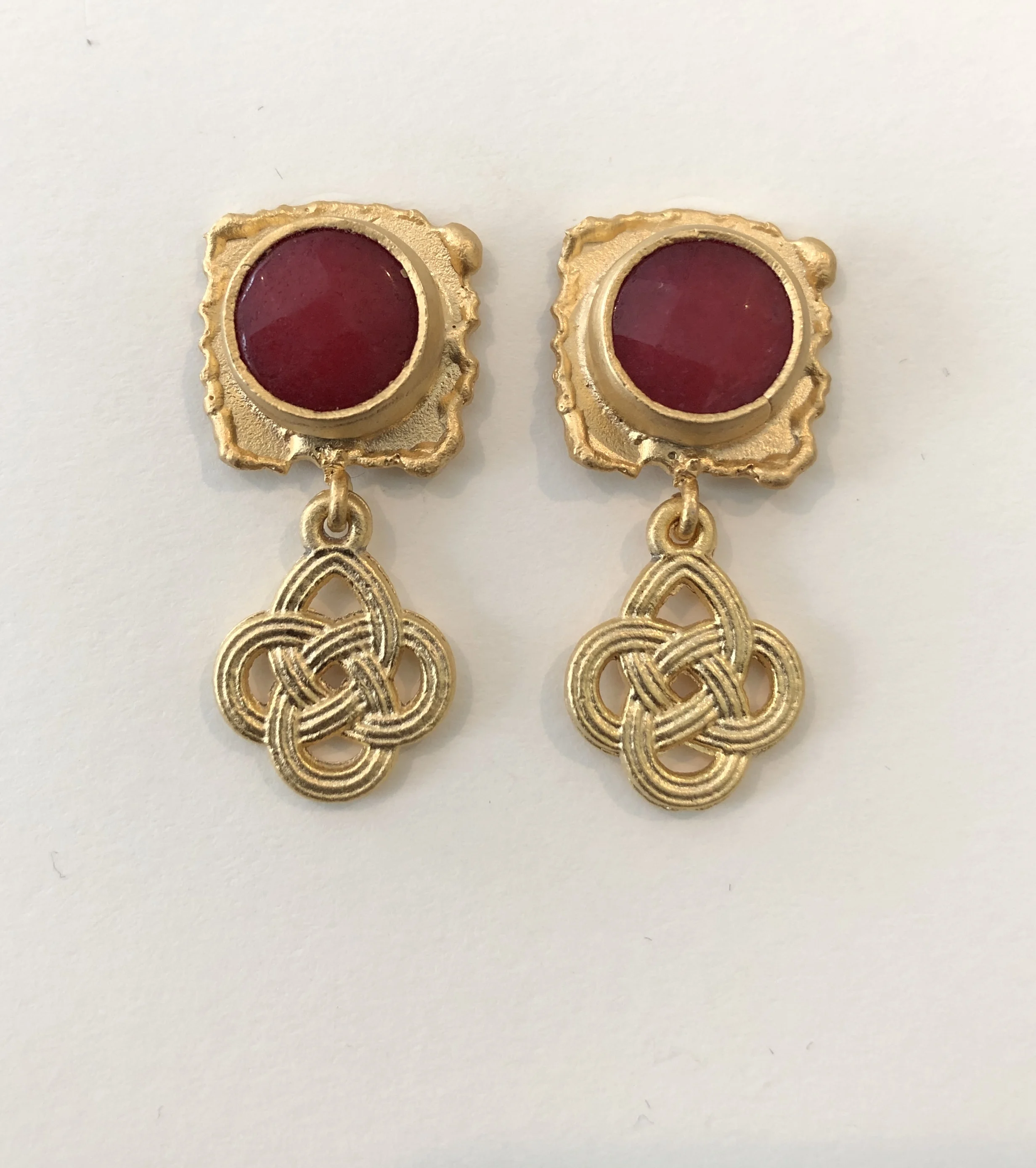 Deep red faceted jade and matte gold post earrings. 
