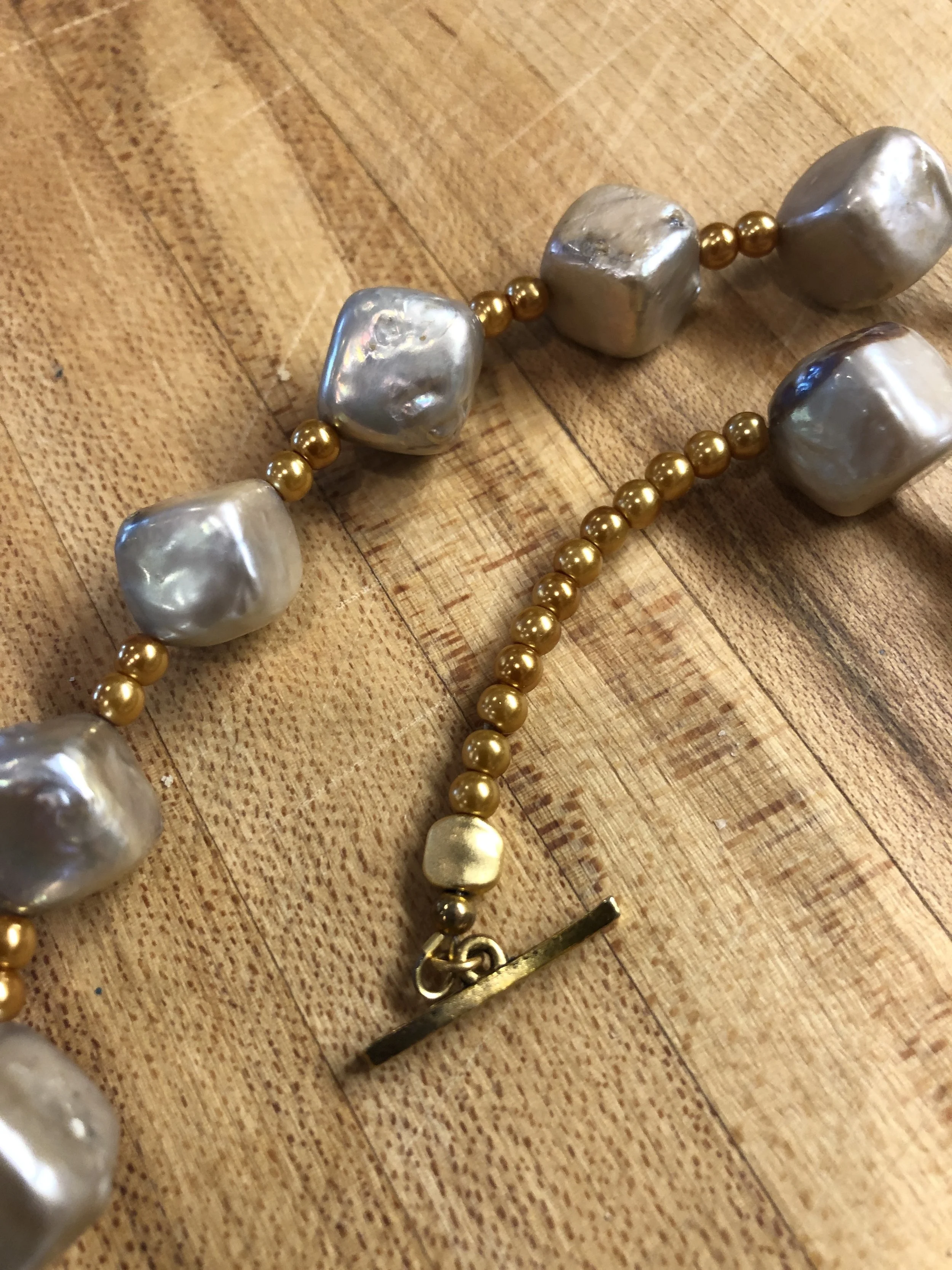 Grey baroque pearl and gold pearl necklace