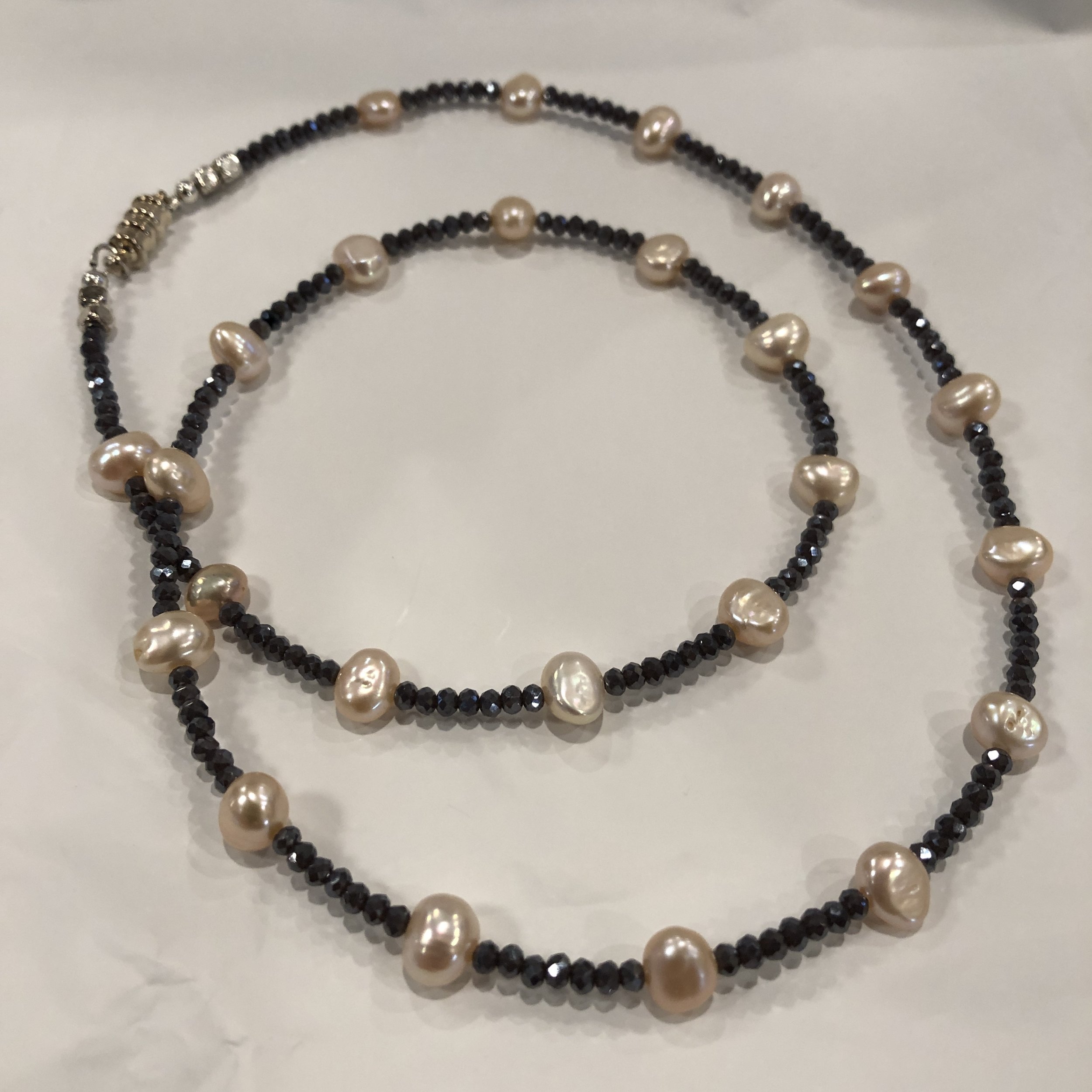 Pale pink freshwater pearls and dusty blue faceted raw sapphires 