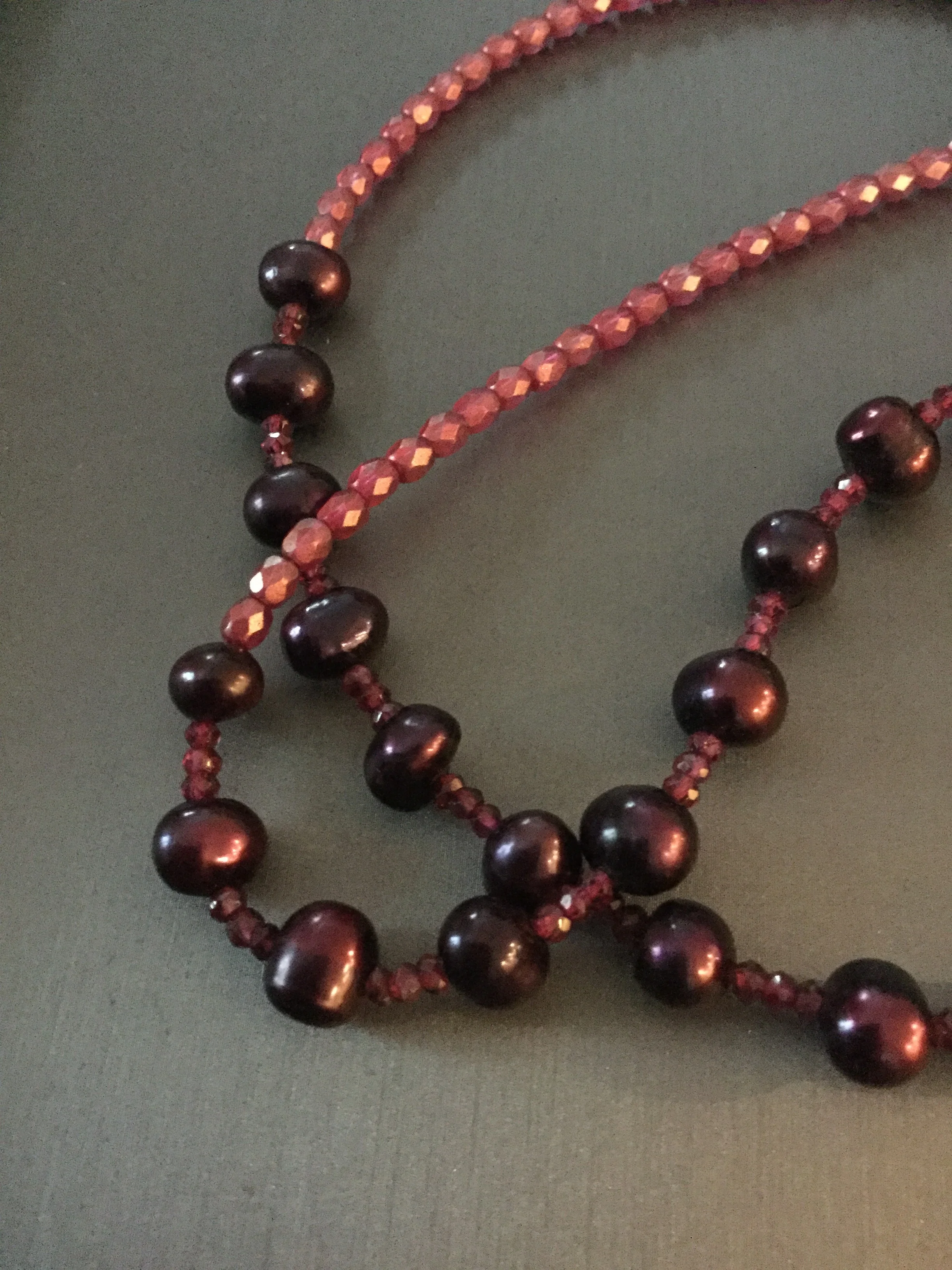 Plum pearls and unpolished rubies