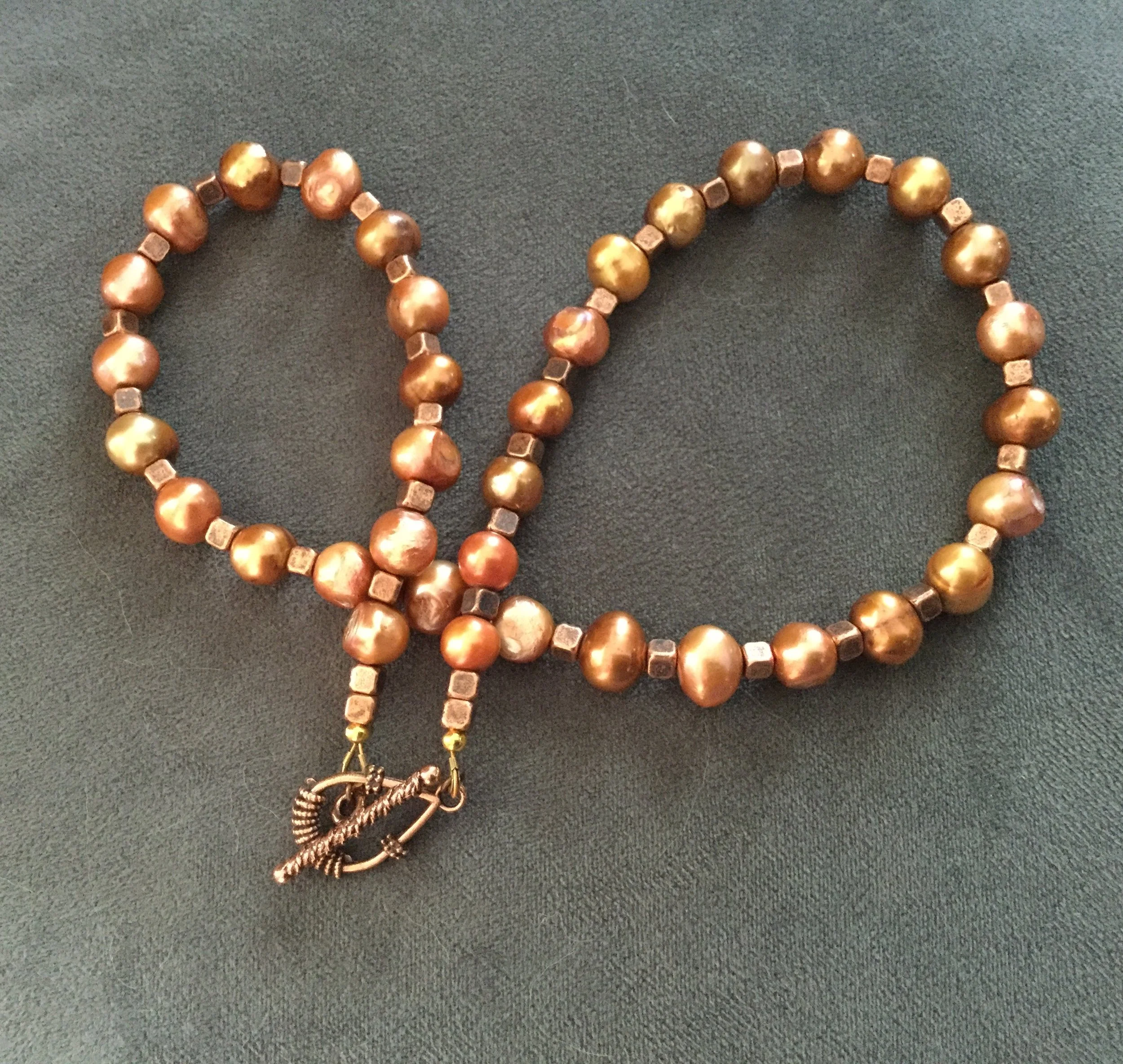 Copper colored pearls and cubes