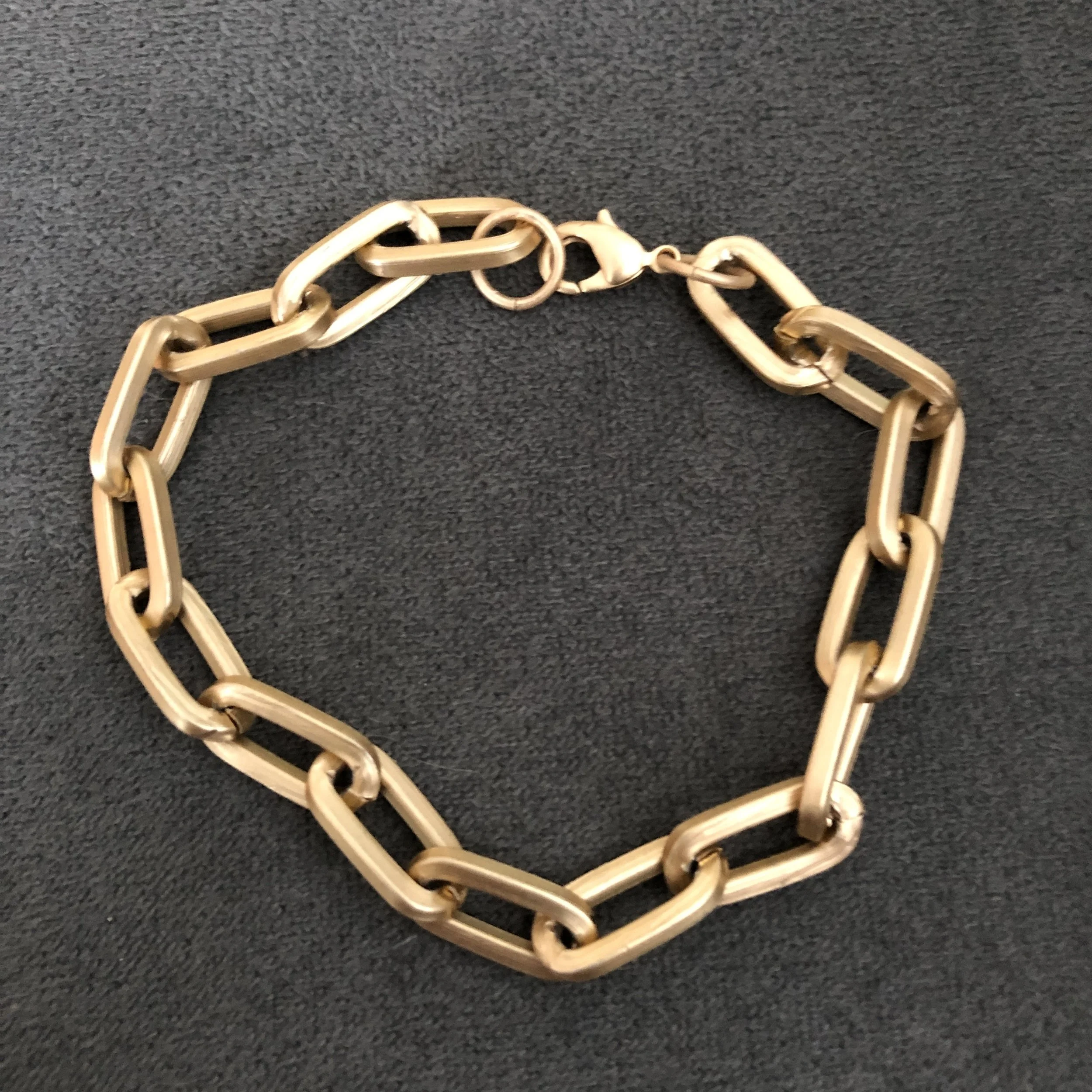 Matte gold oval link bracelet