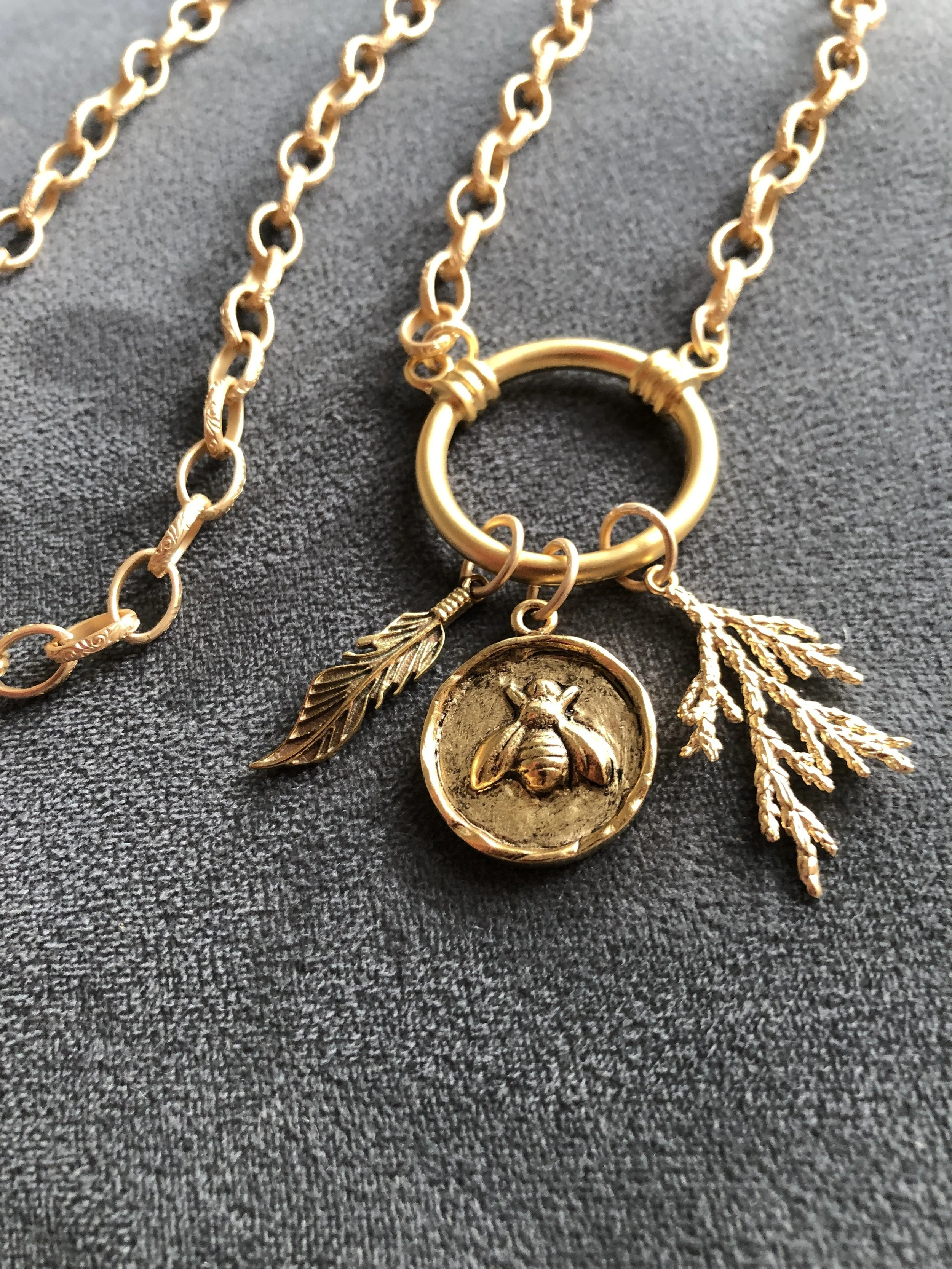Gold charm necklace