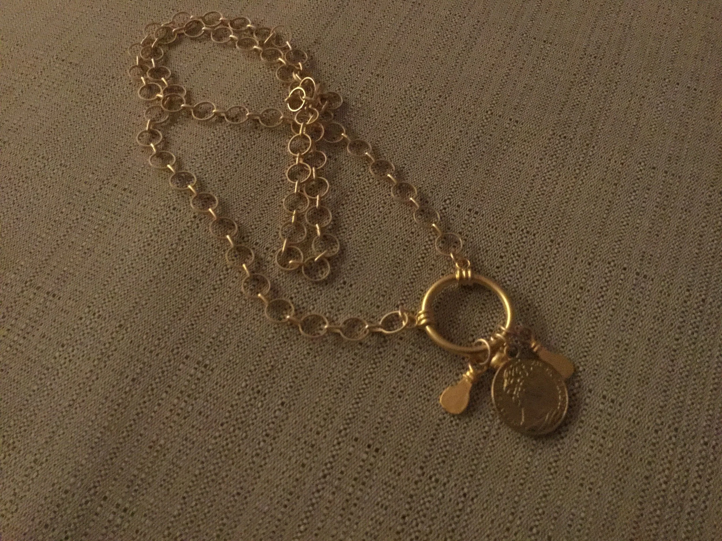 Charm necklace with coin and matte gold