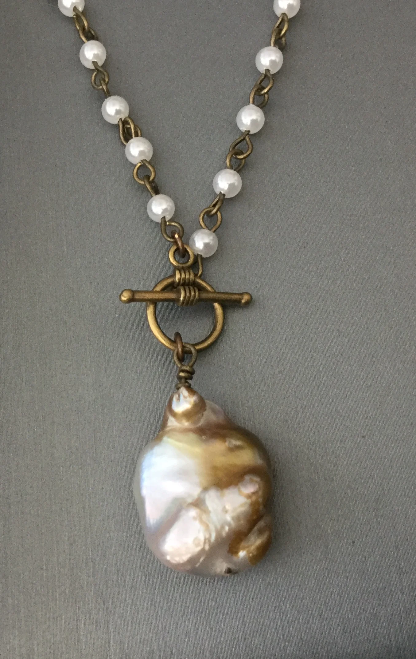 Baroque pearl and bronze
