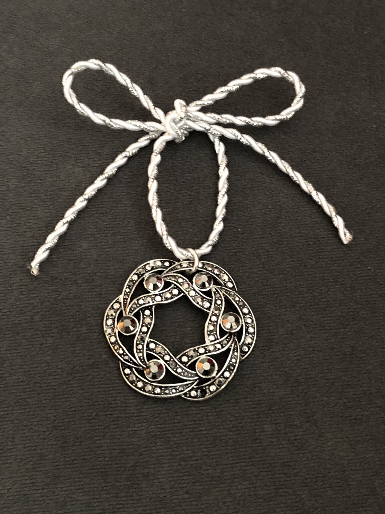 Braided silver wreath ornament