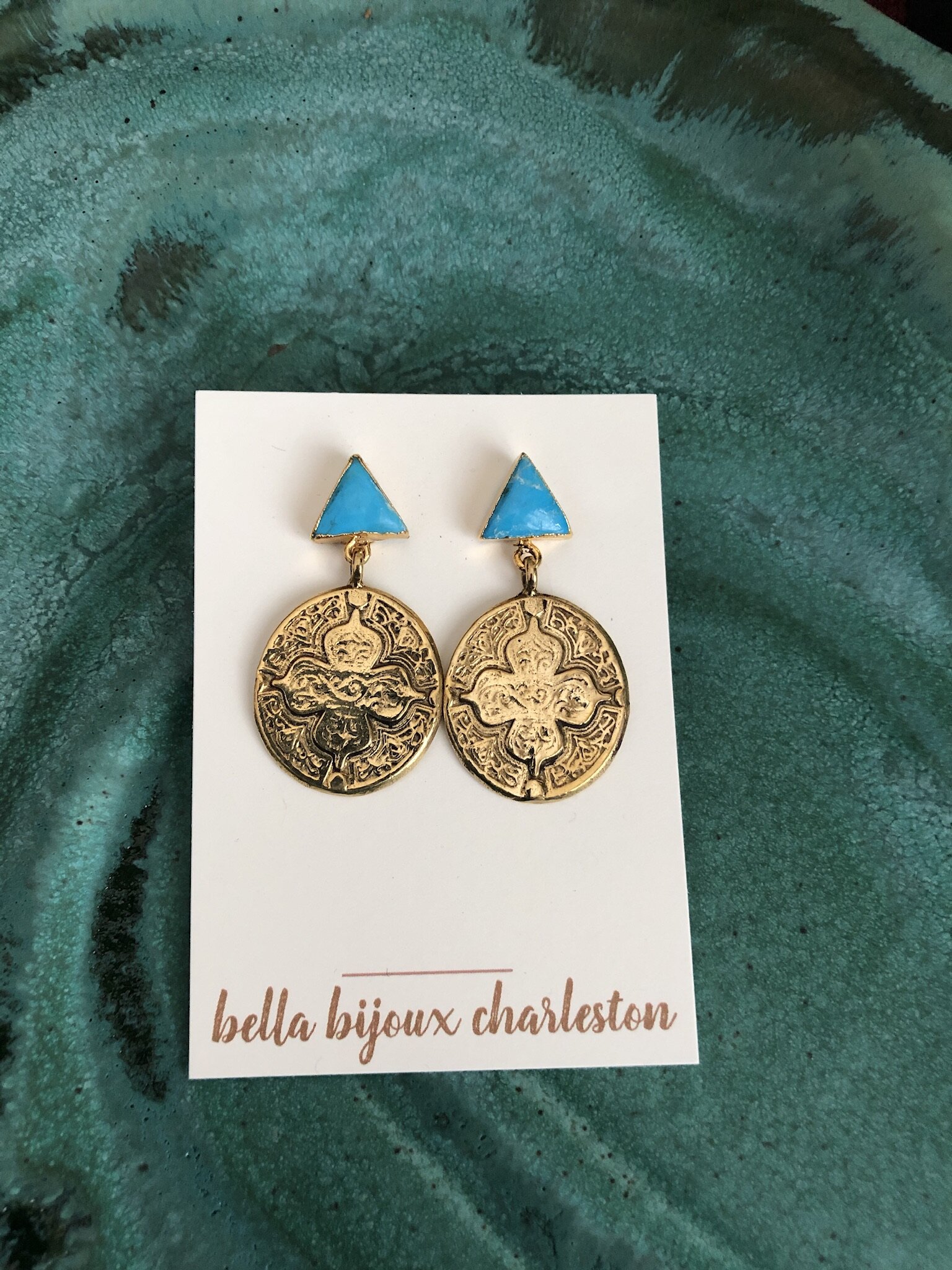 Turquoise triangles and medallions