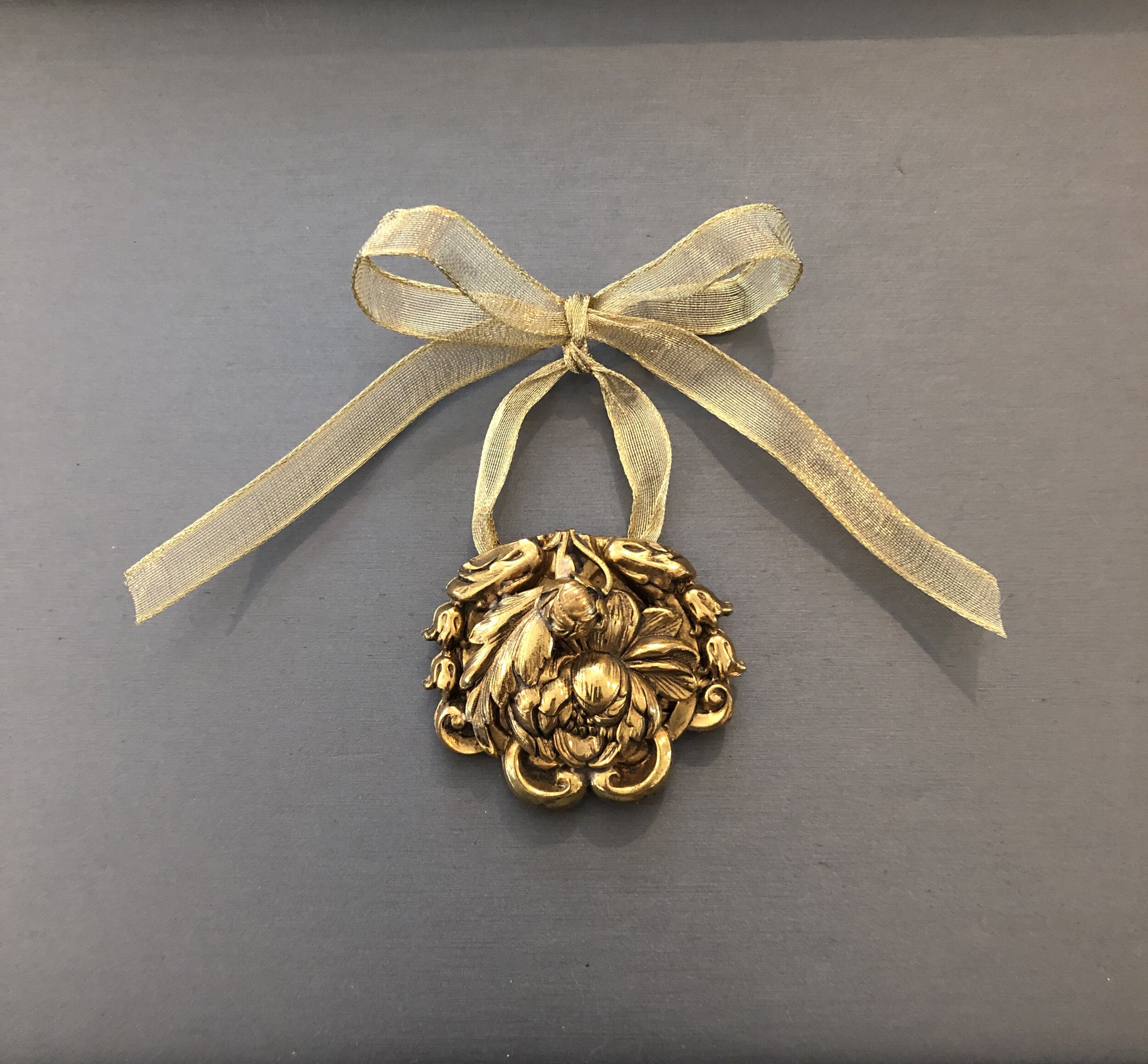 Golden doorknocker ornament