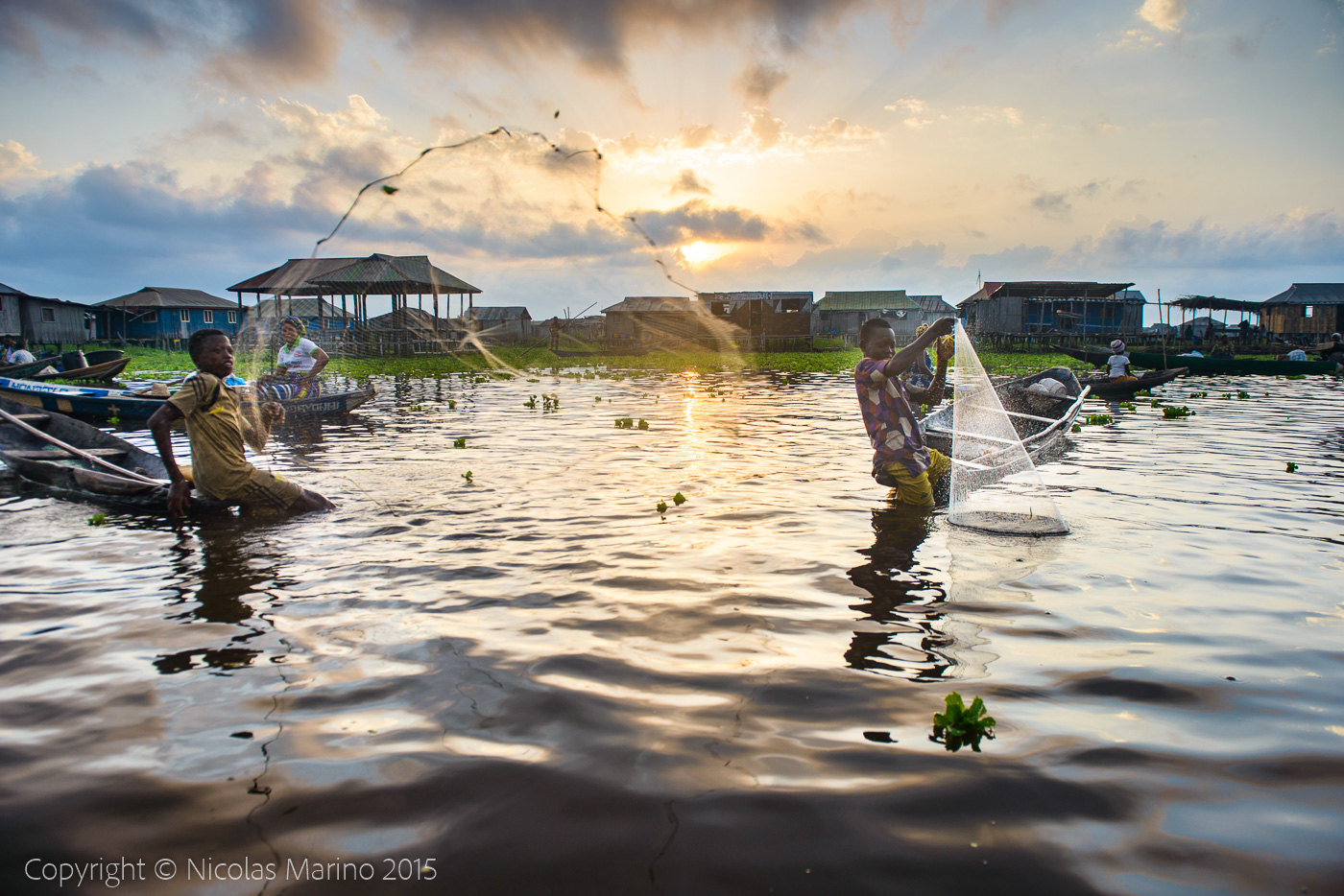 People of the floating village of Ganvié. Benin