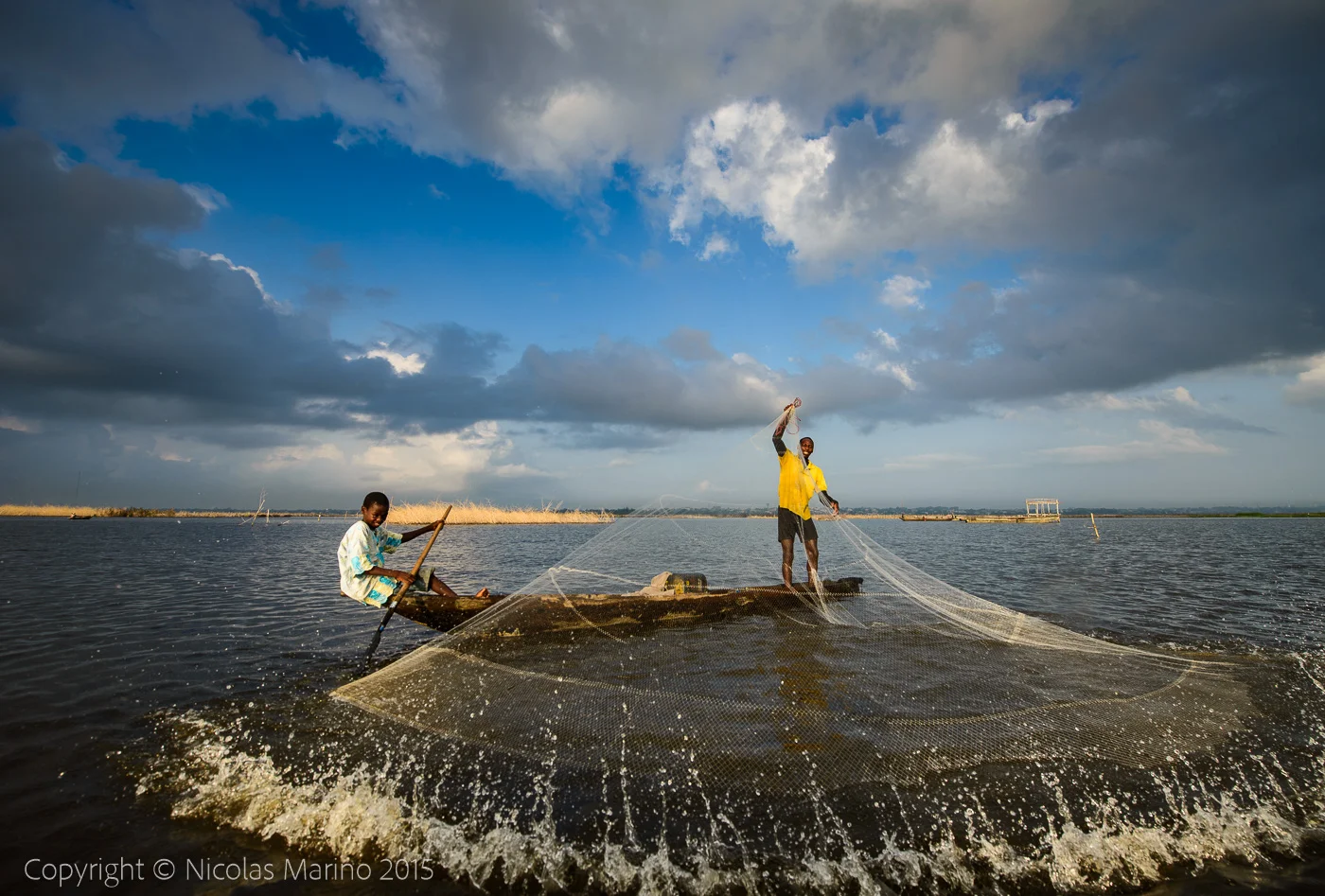 People of the floating village of Ganvié. Benin