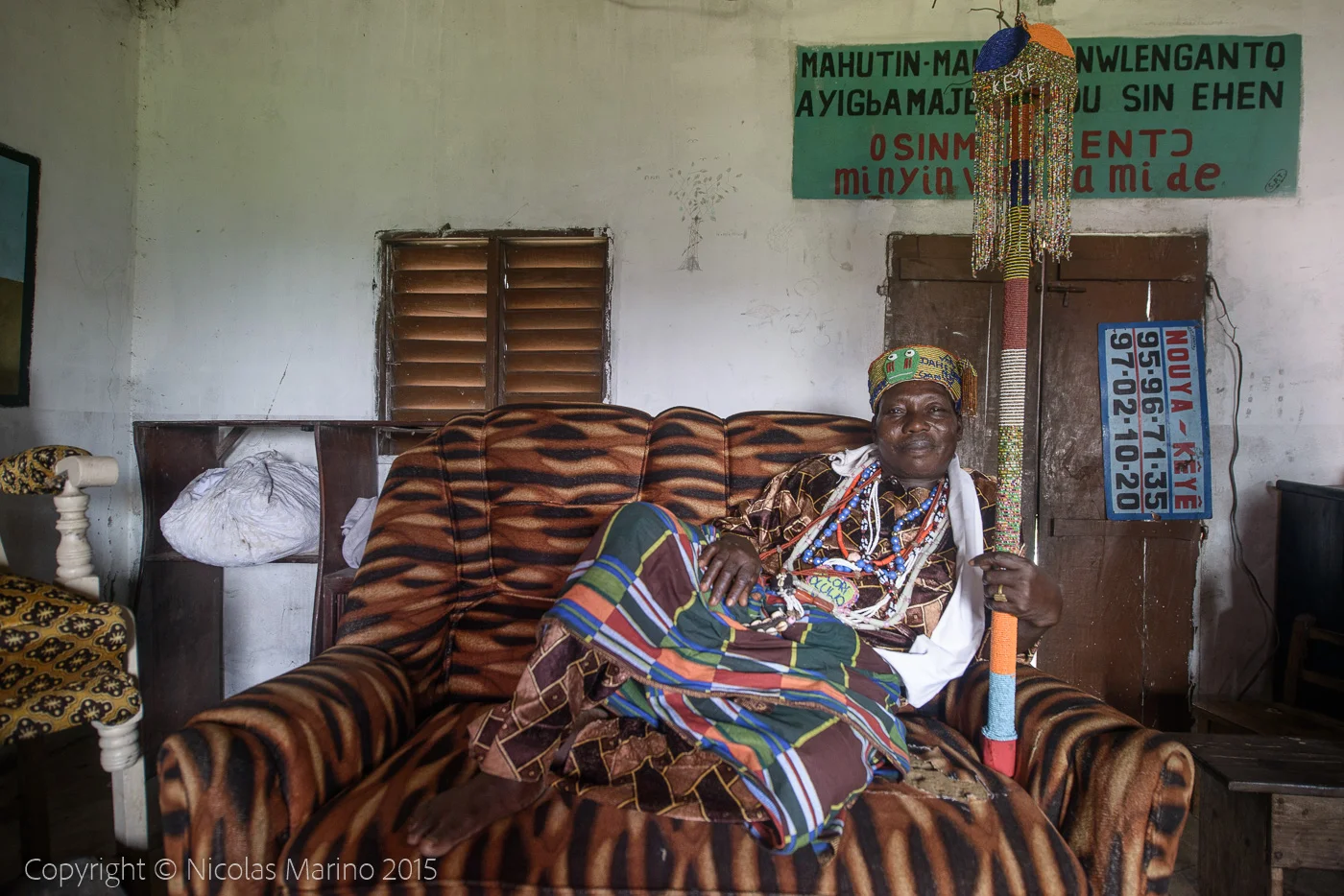 The king of Ganvié, a voodoo priest and his fetishes.