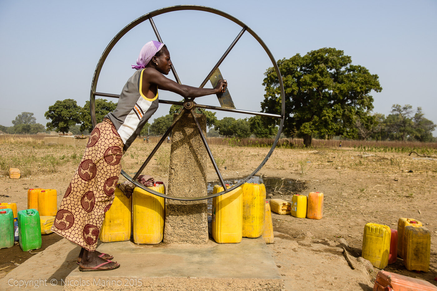 manual water pumping. Burkina Faso