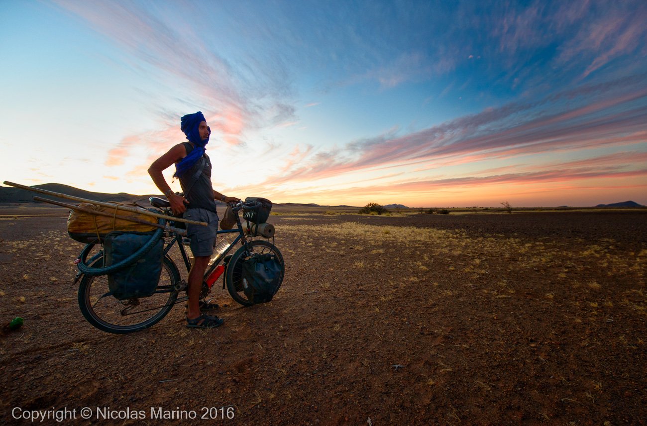  Cycling in the Adrar region of the Sahara desert. Mauritania 