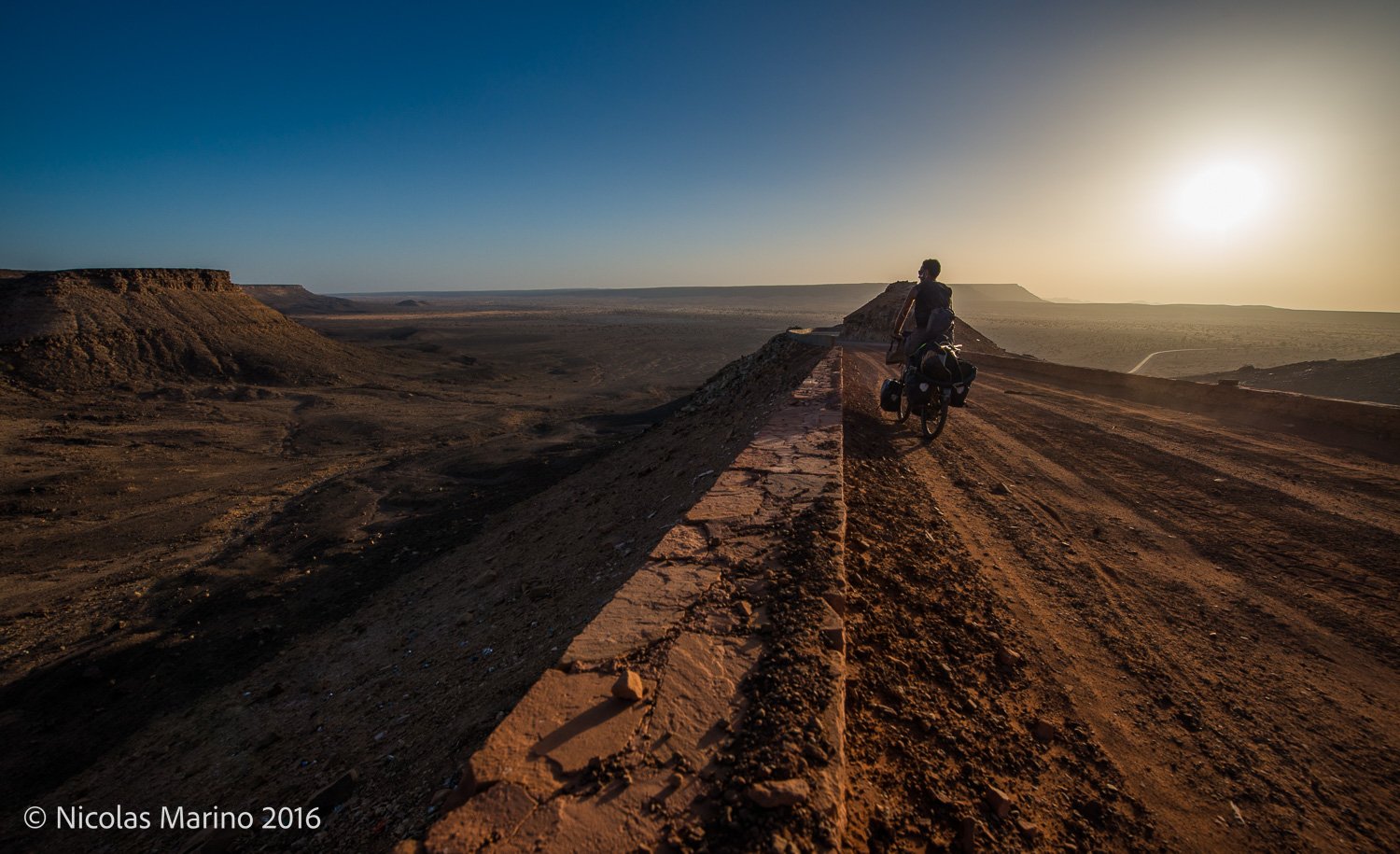  Cycling in the Adrar region of the Sahara desert. Mauritania 