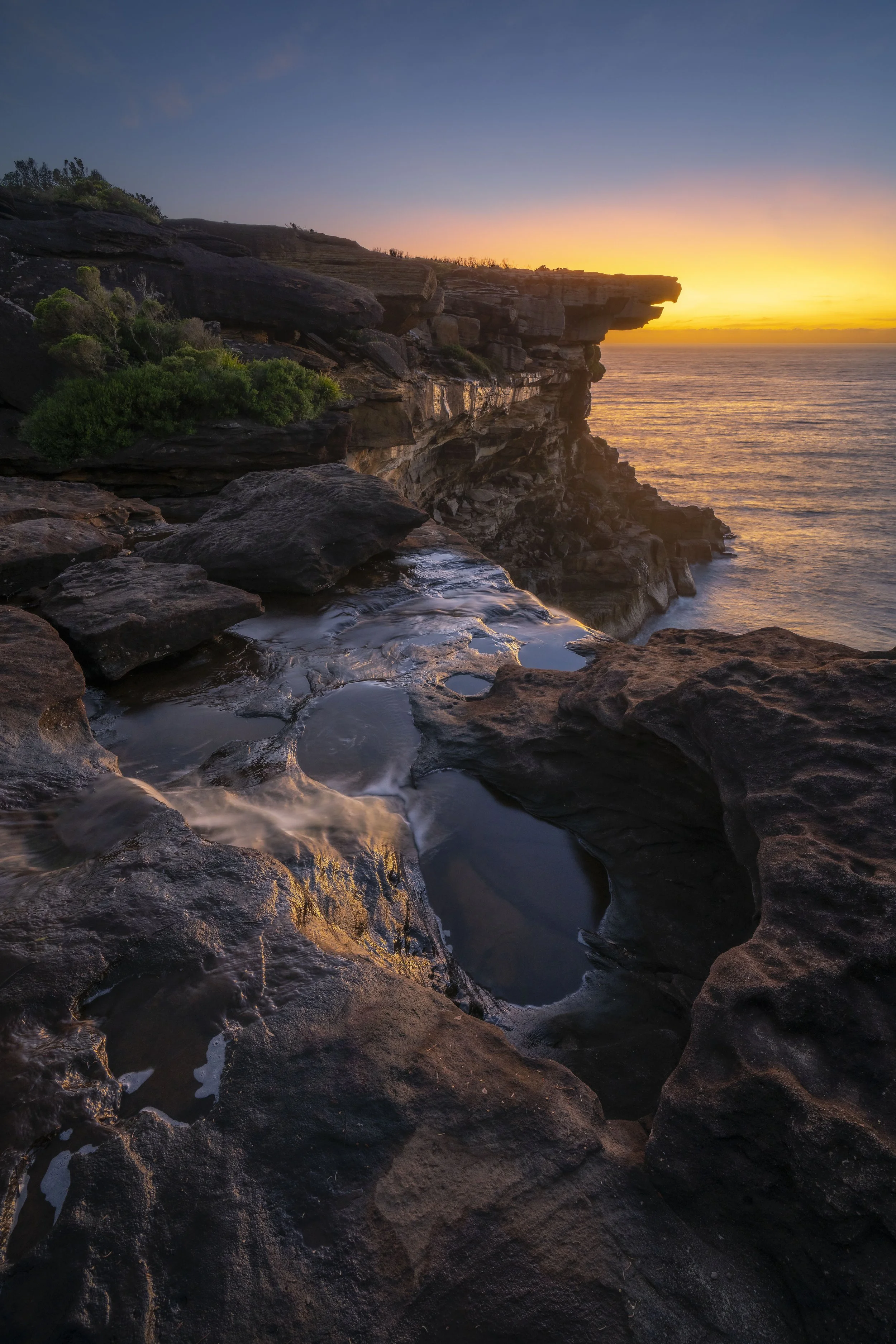 Rock formation resembling an eagle's head on the coast