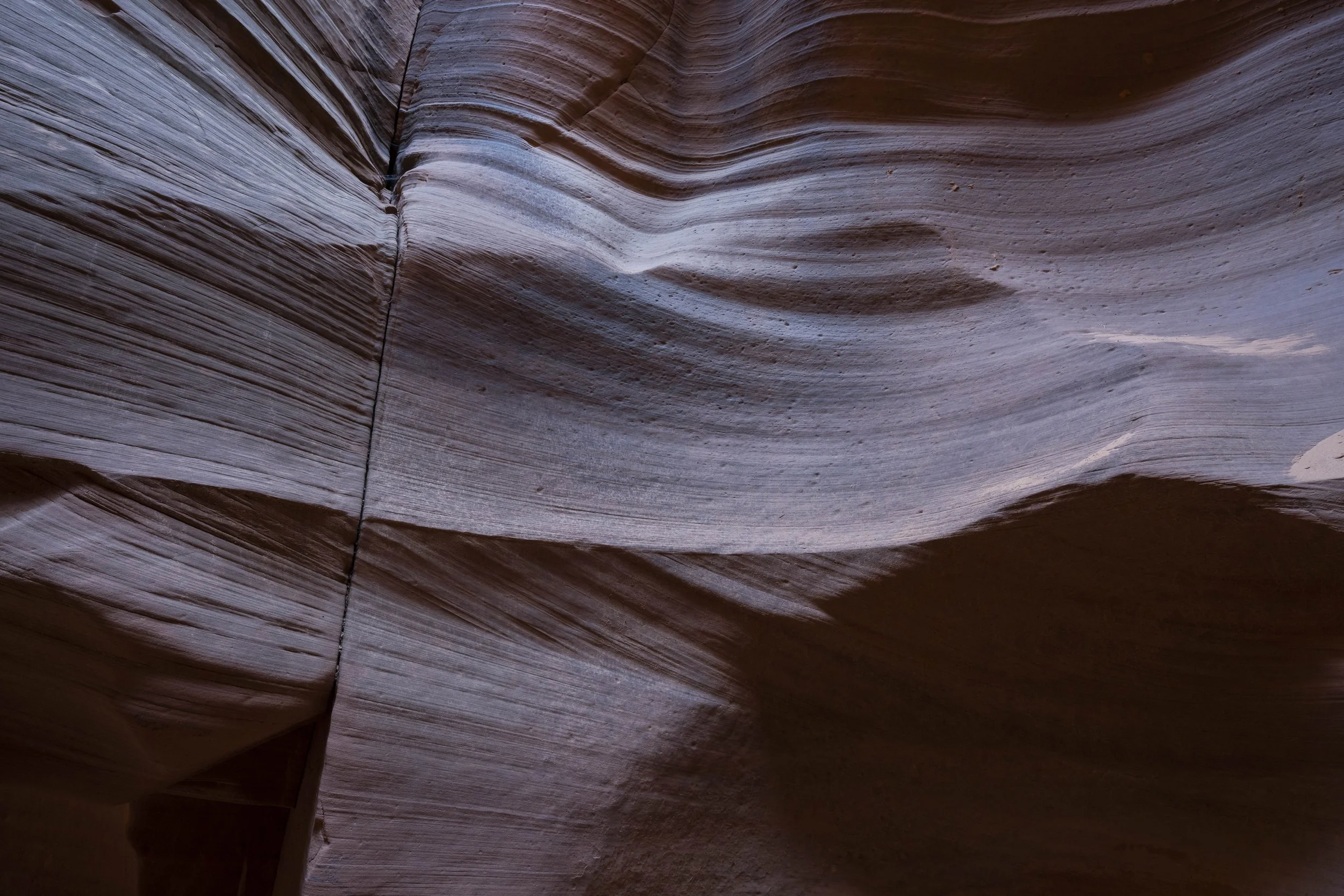 Textured canyon walls showing rock layers
