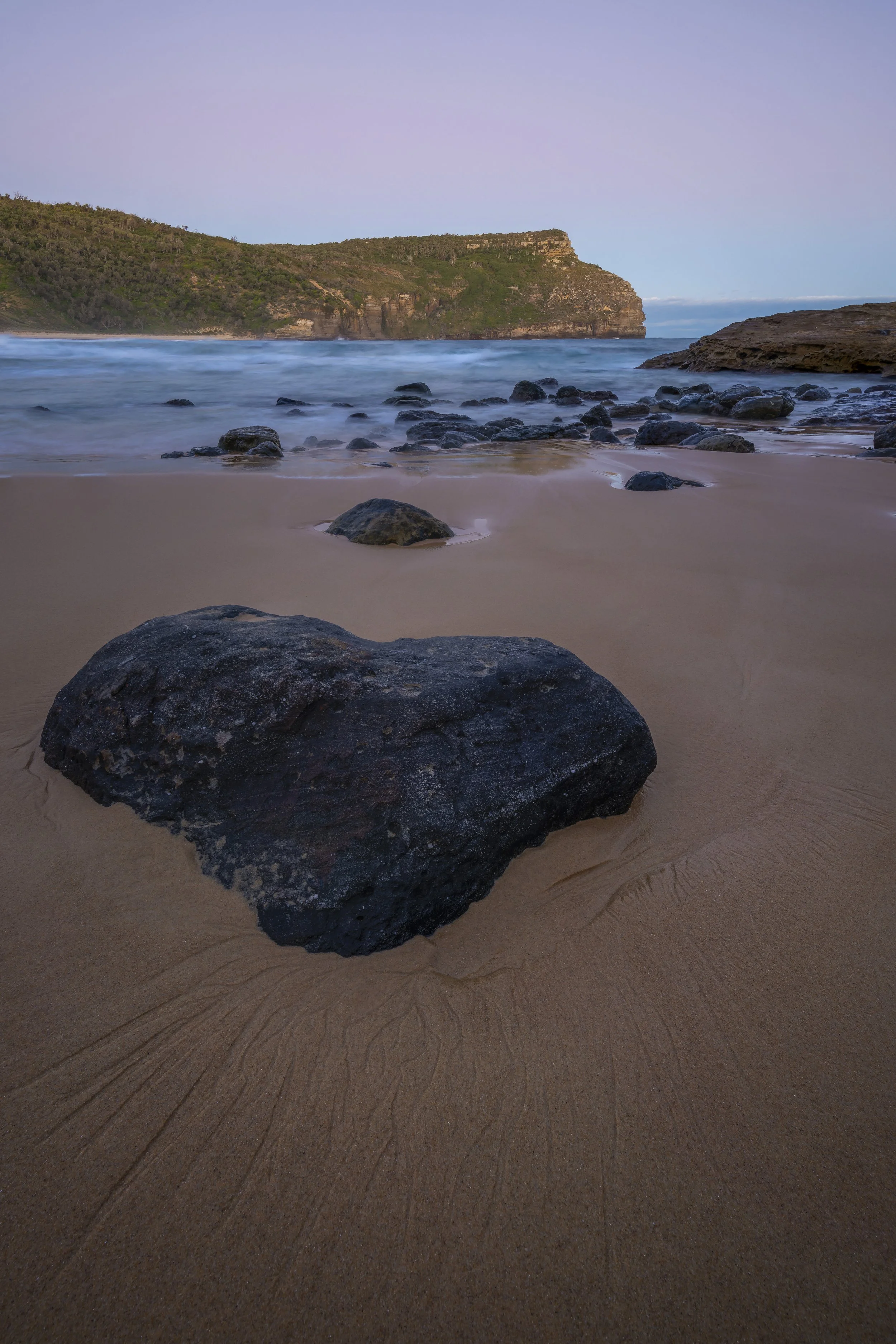 Pastel sunset over Steamers Beach, New South Wales