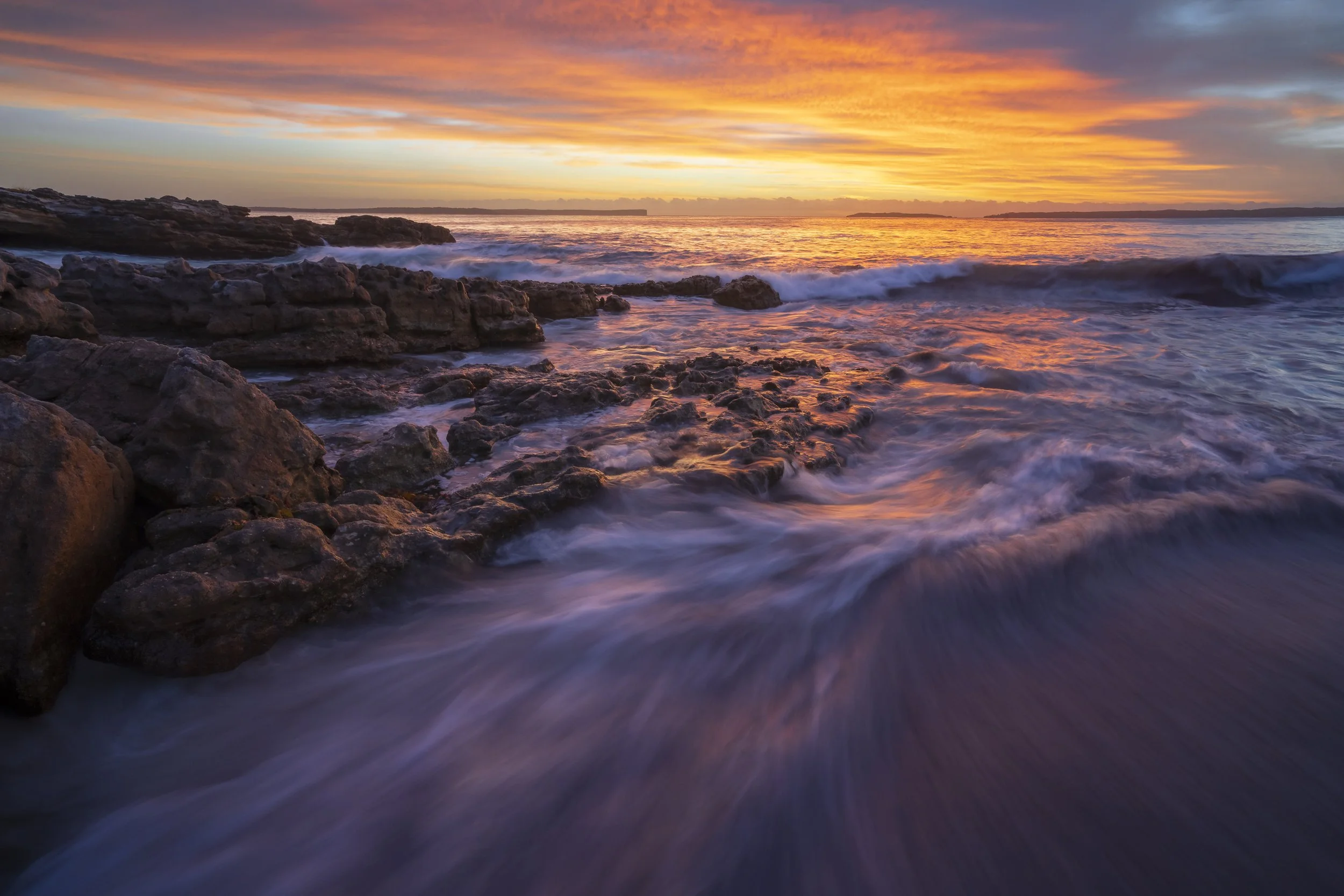 Vibrant sunrise over Hyams Beach, New South Wales
