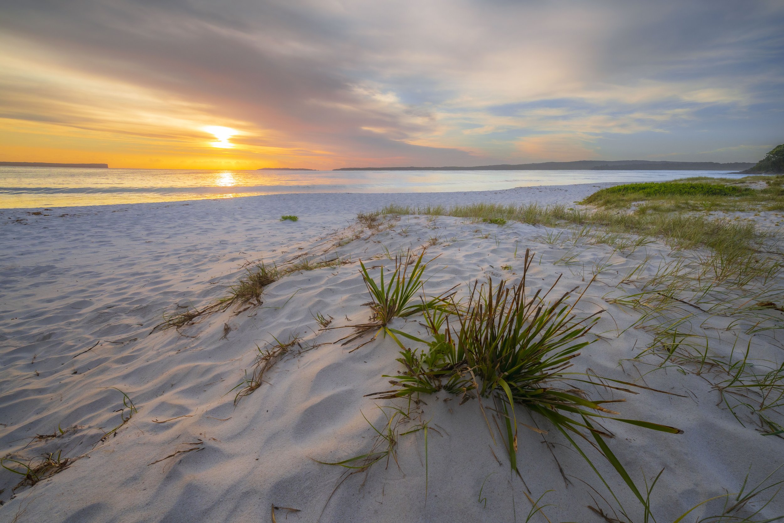 Vibrant sunrise over Hyams Beach, New South Wales