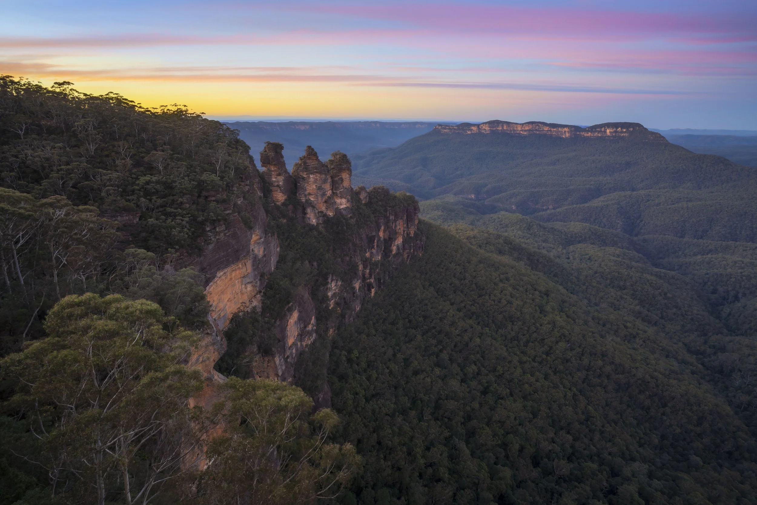 The Three Sisters in the Blue Mountains bathed in vibrant sunrise colours