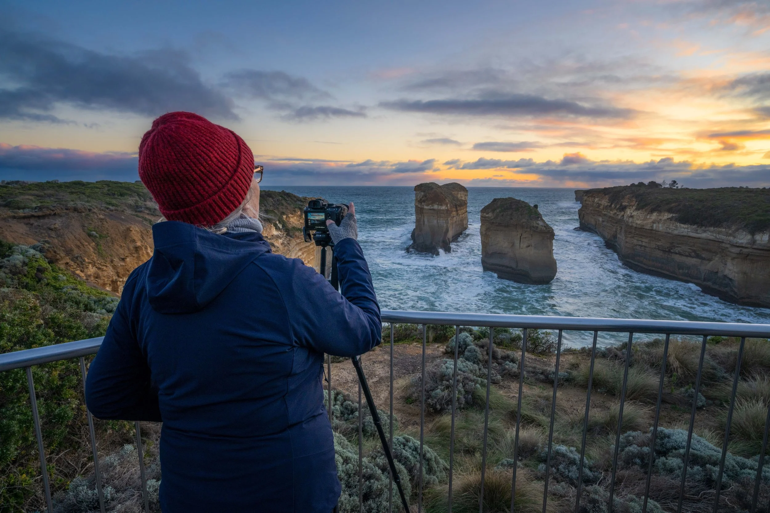 Photography workshop participant capturing sunset views